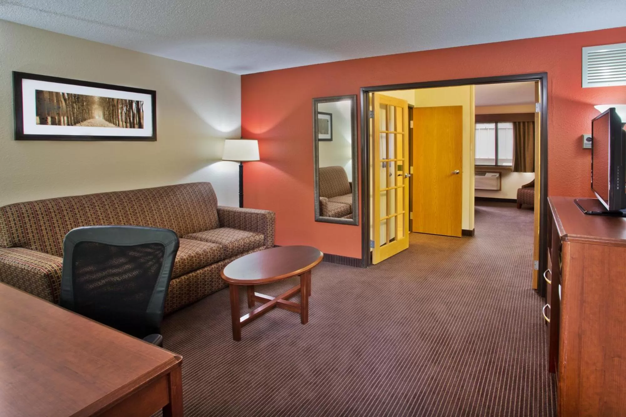 TV and multimedia in AmericInn by Wyndham Grand Forks