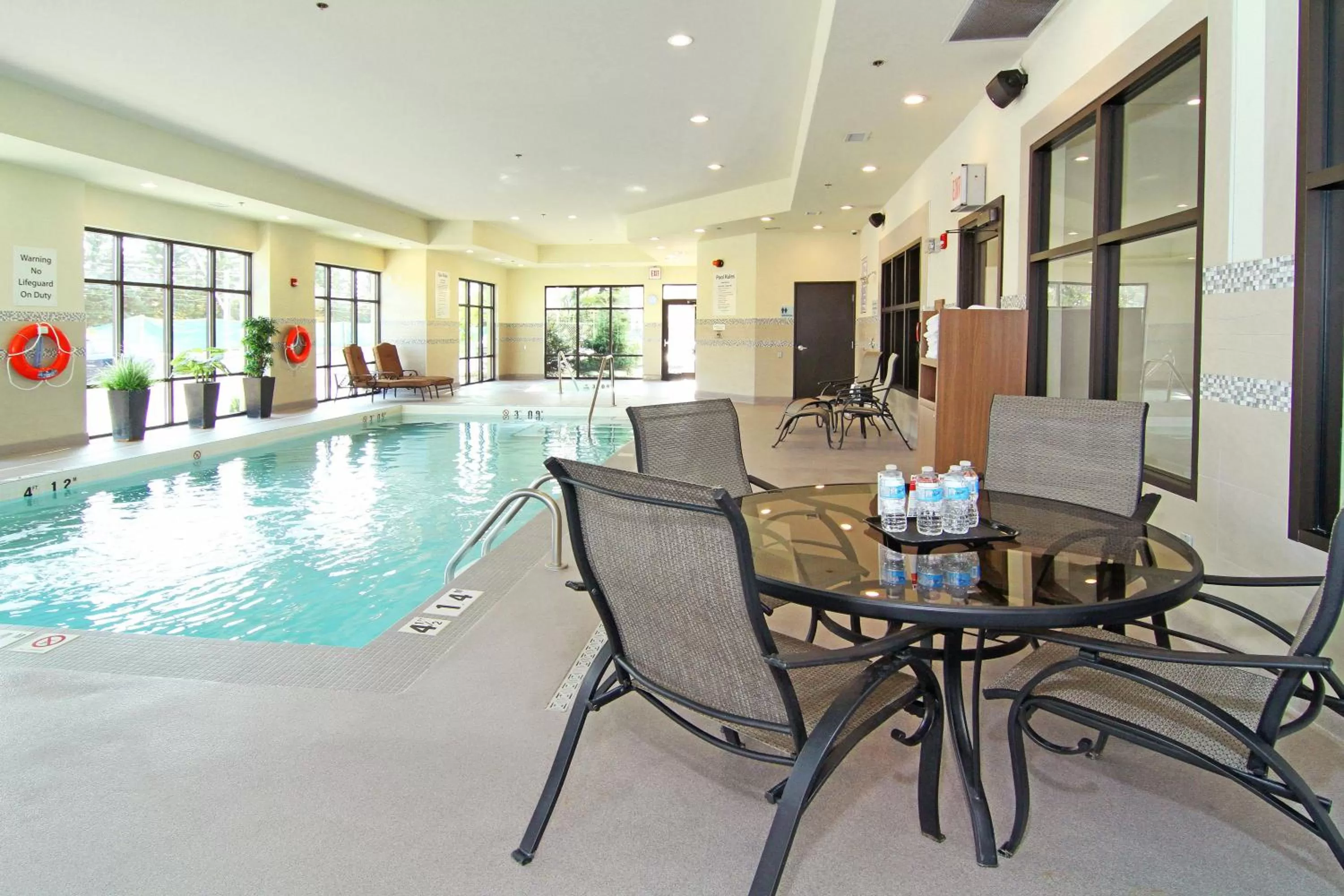 Swimming pool in Holiday Inn Express and Suites Calgary University by IHG