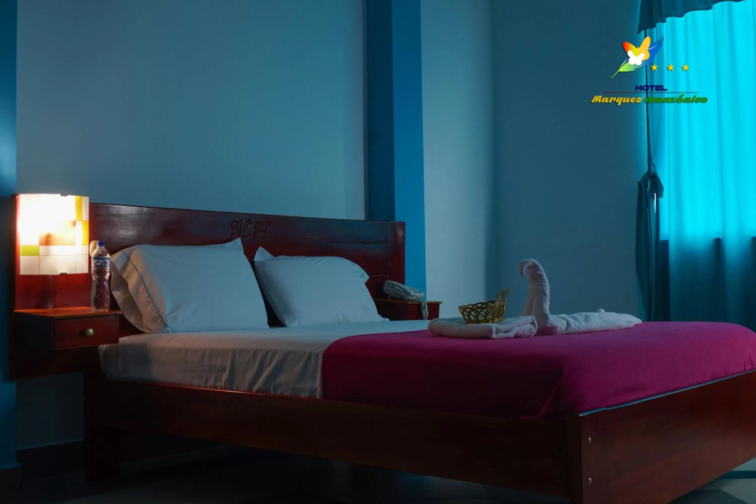 Bed in Hotel Marques Amazonico