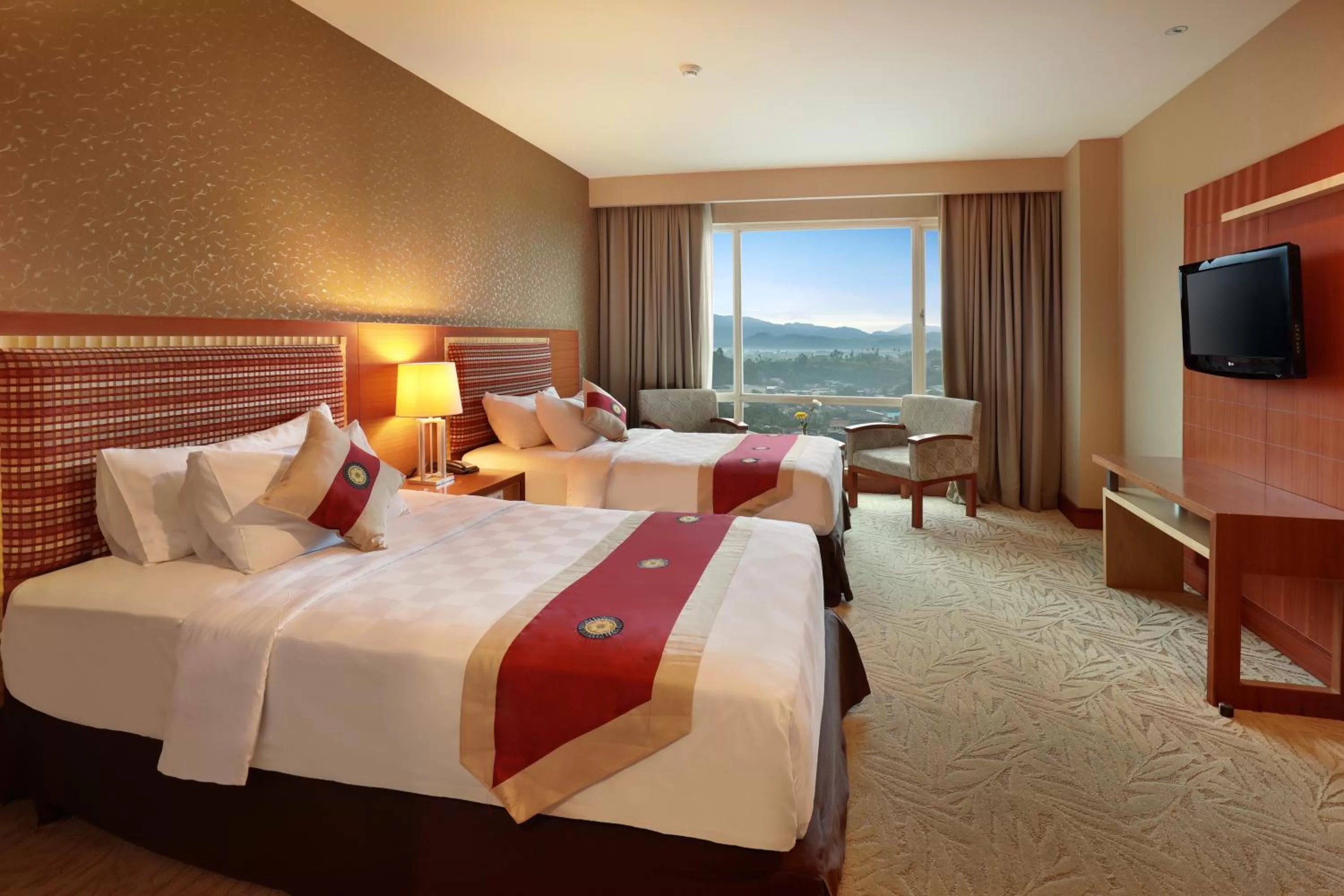 Photo of the whole room, Bed in Swiss-Belhotel Maleosan Manado