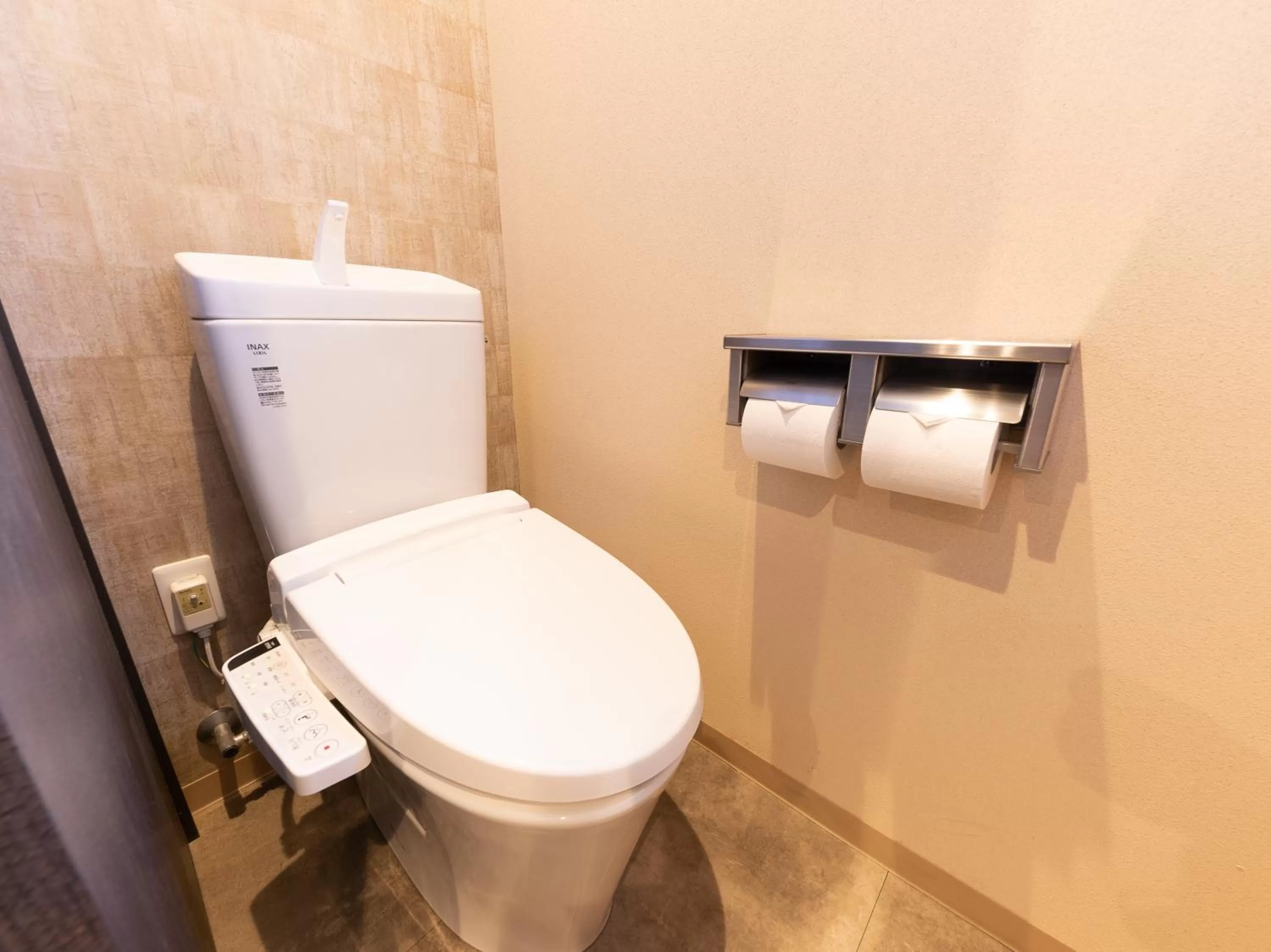 Toilet in Hiromas Hotel Kura