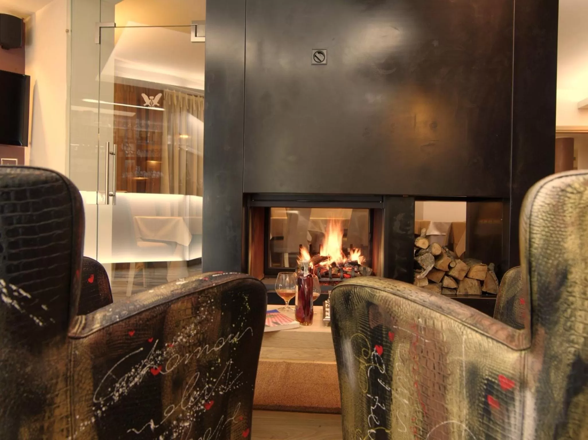 Communal lounge/ TV room, Seating Area in Hotel Natura