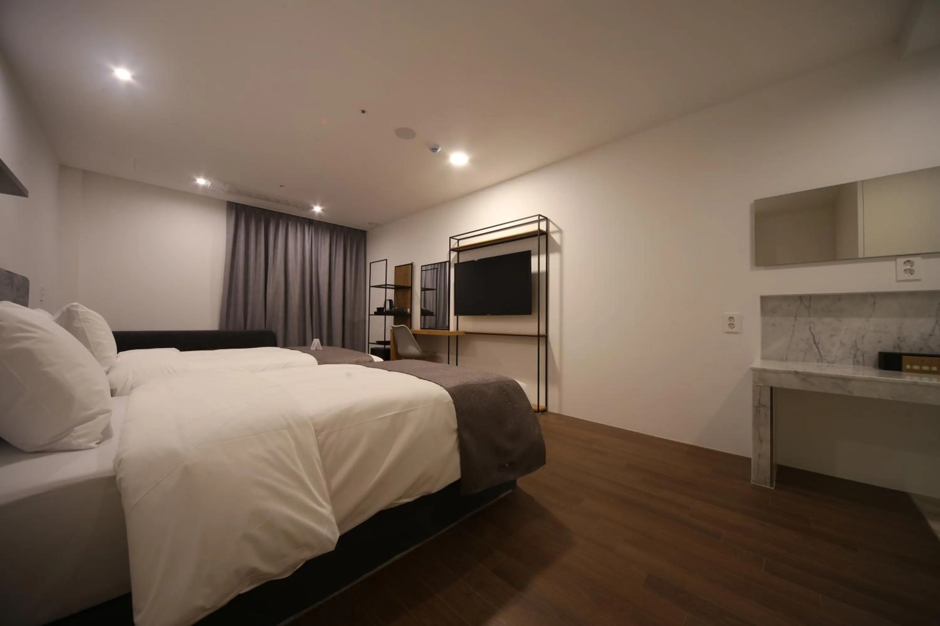 Bed in Hotel Noblestay