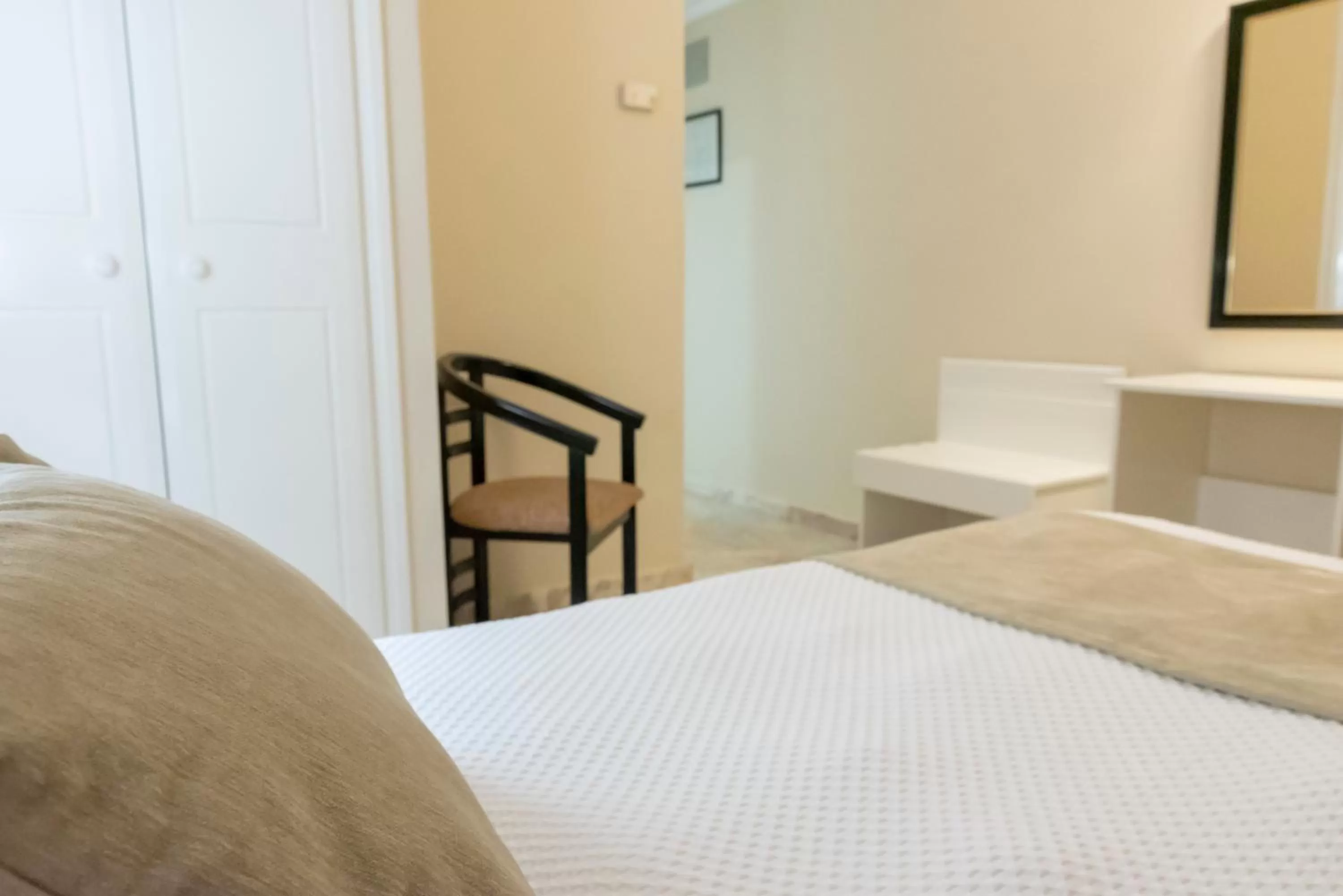 Bed in Hotel Ramomar