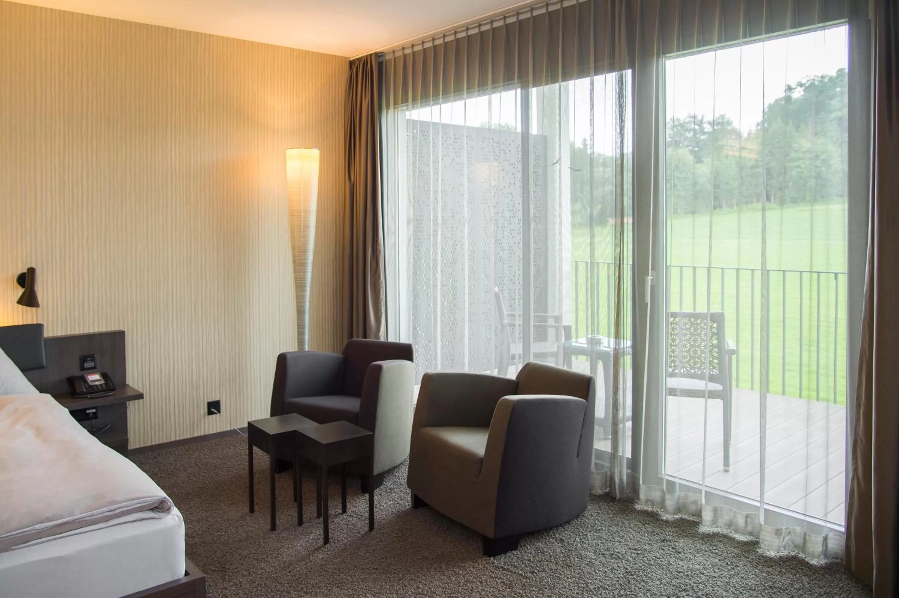 Photo of the whole room, Bed in Wellnesshotel Golfpanorama