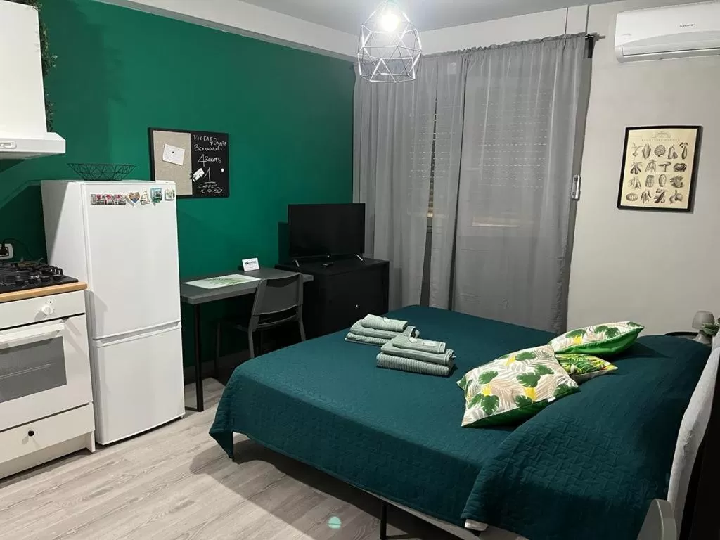 TV/Entertainment Center in 4ROOMS b&b - HOLIDAY HOME