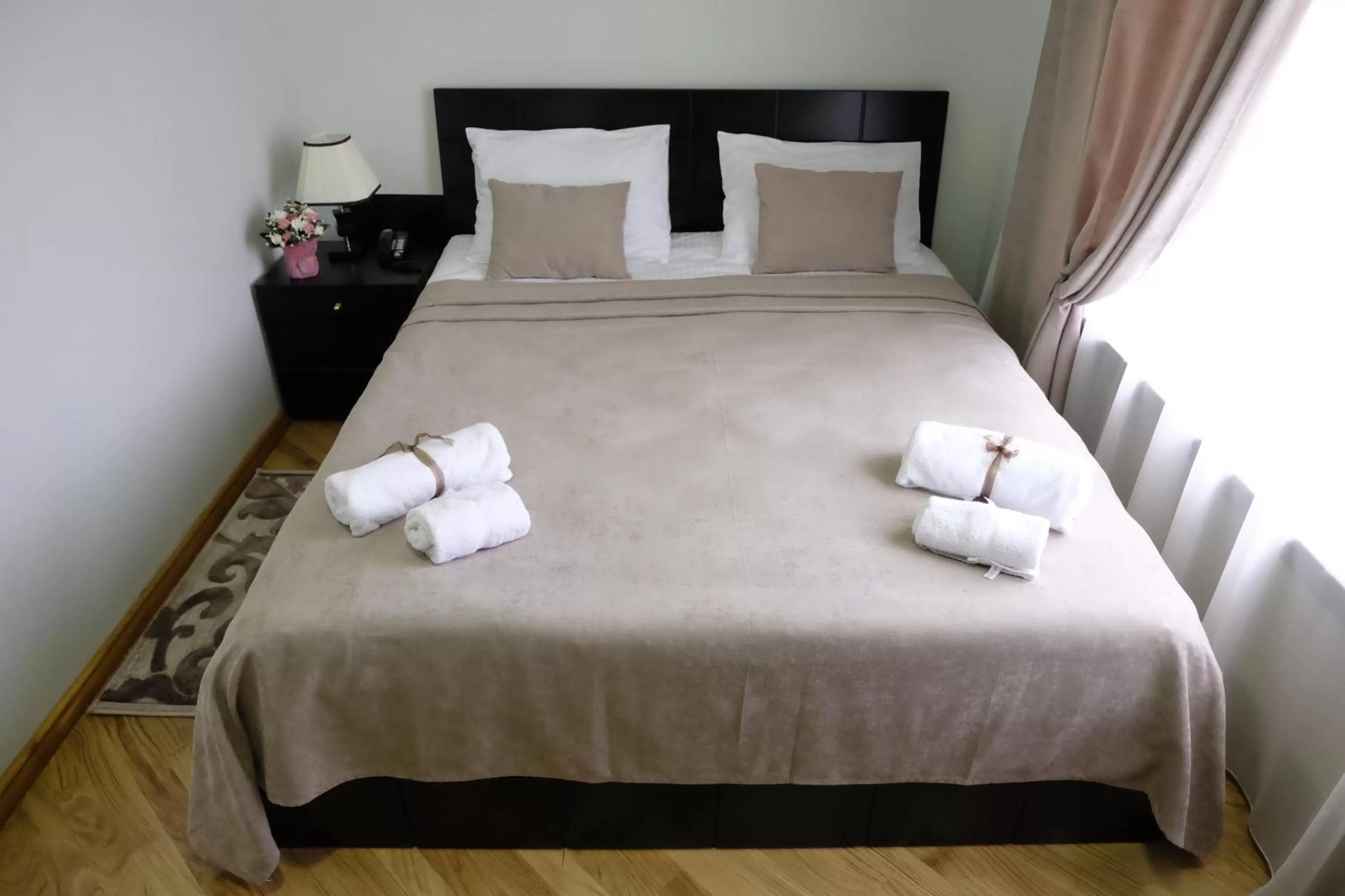 Bed in S&L Boutique Hotel