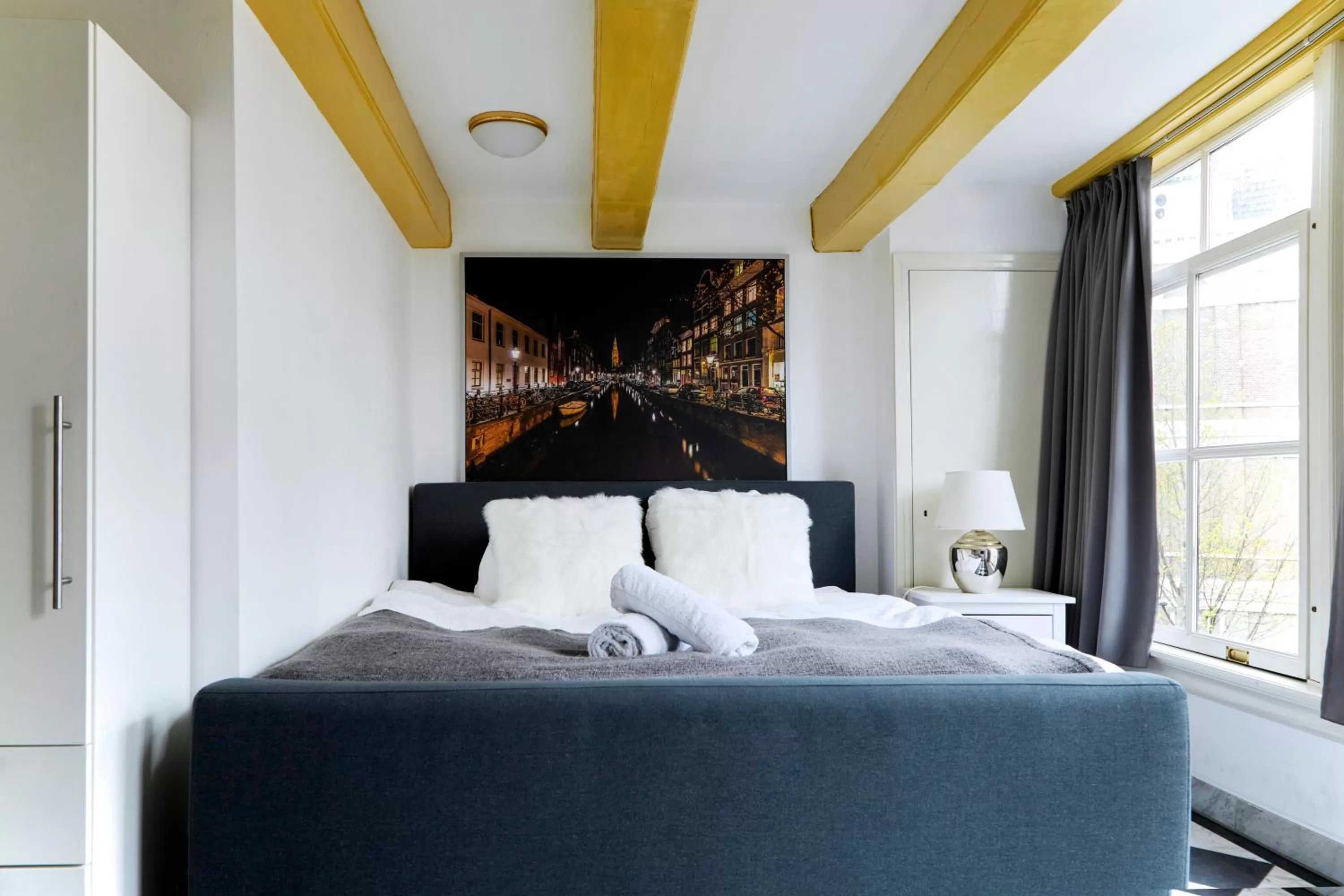 Bed in Modern Canal House Loft - City Center