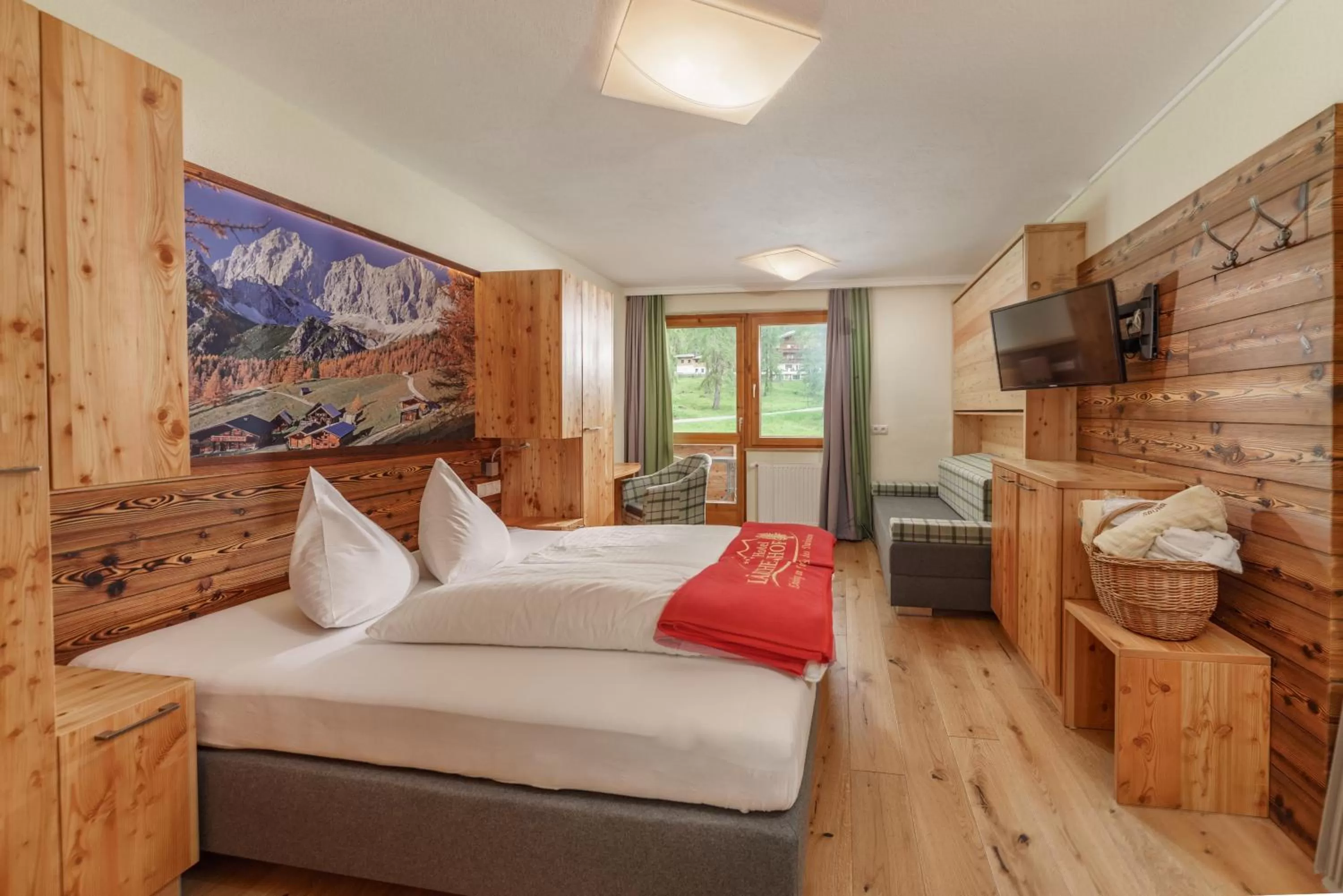 Photo of the whole room, Bed in Naturhotel Lärchenhof