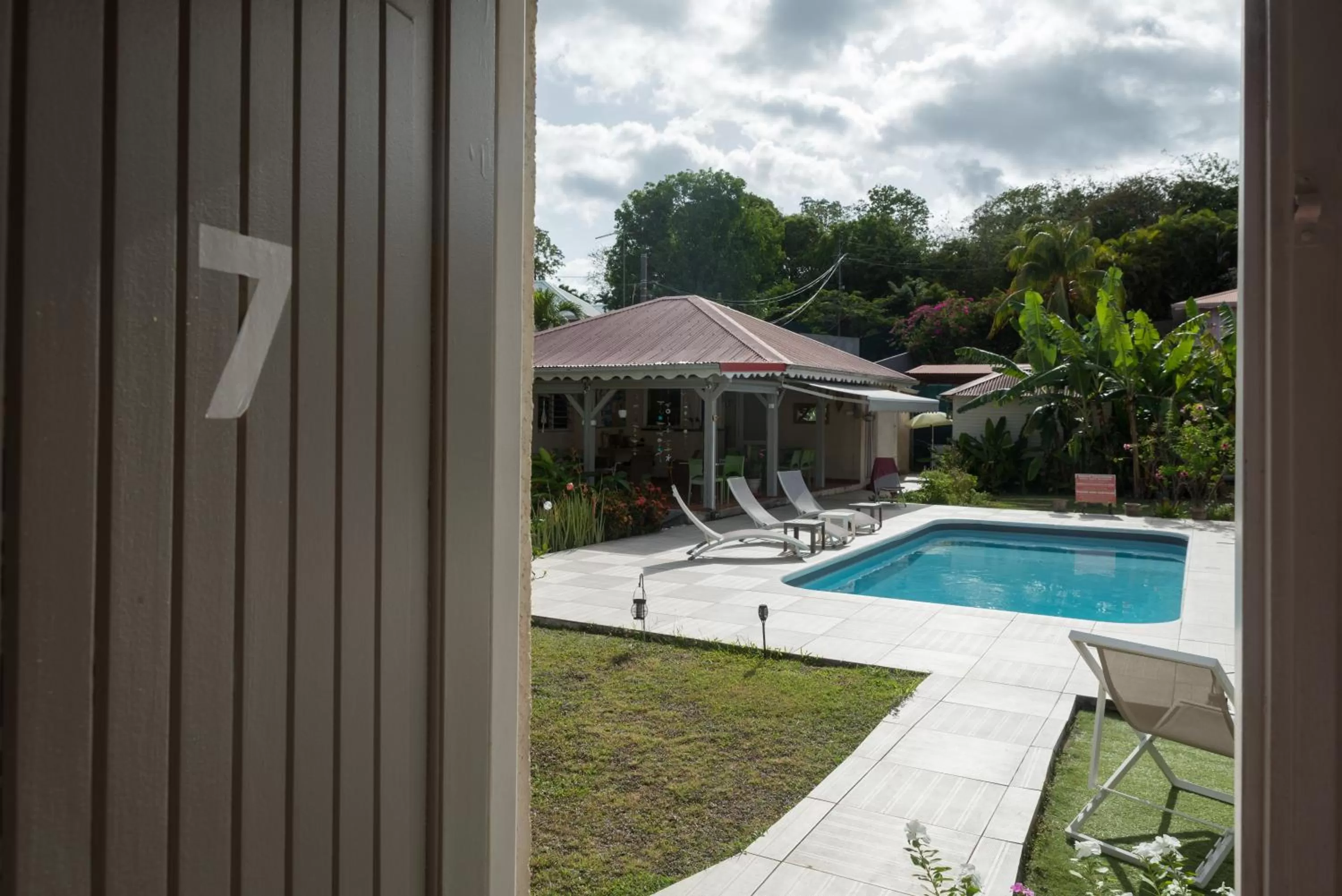 Pool view in Hôtel Les Bananiers