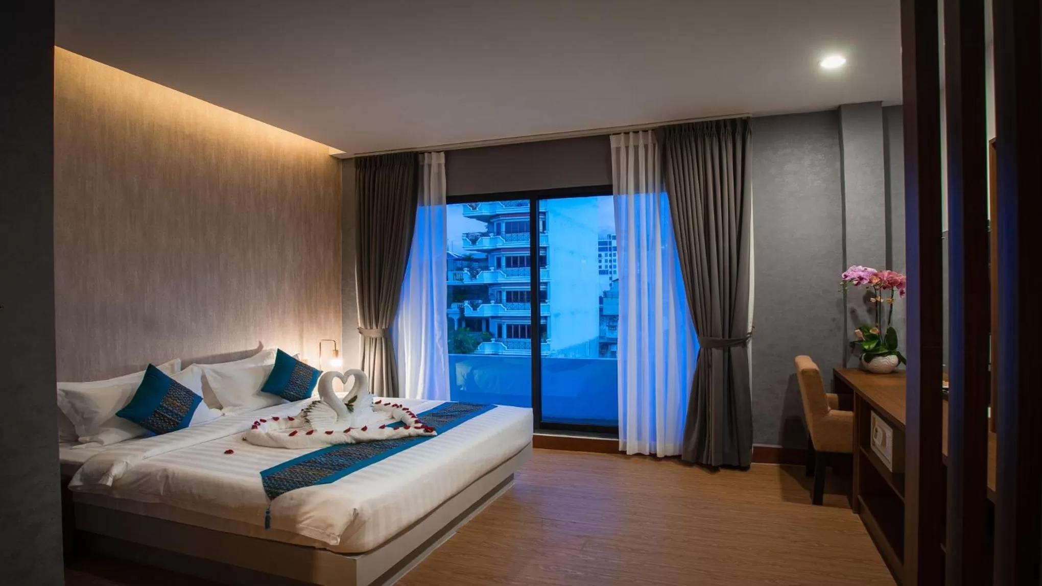 Photo of the whole room, Bed in Orussey One Boutique