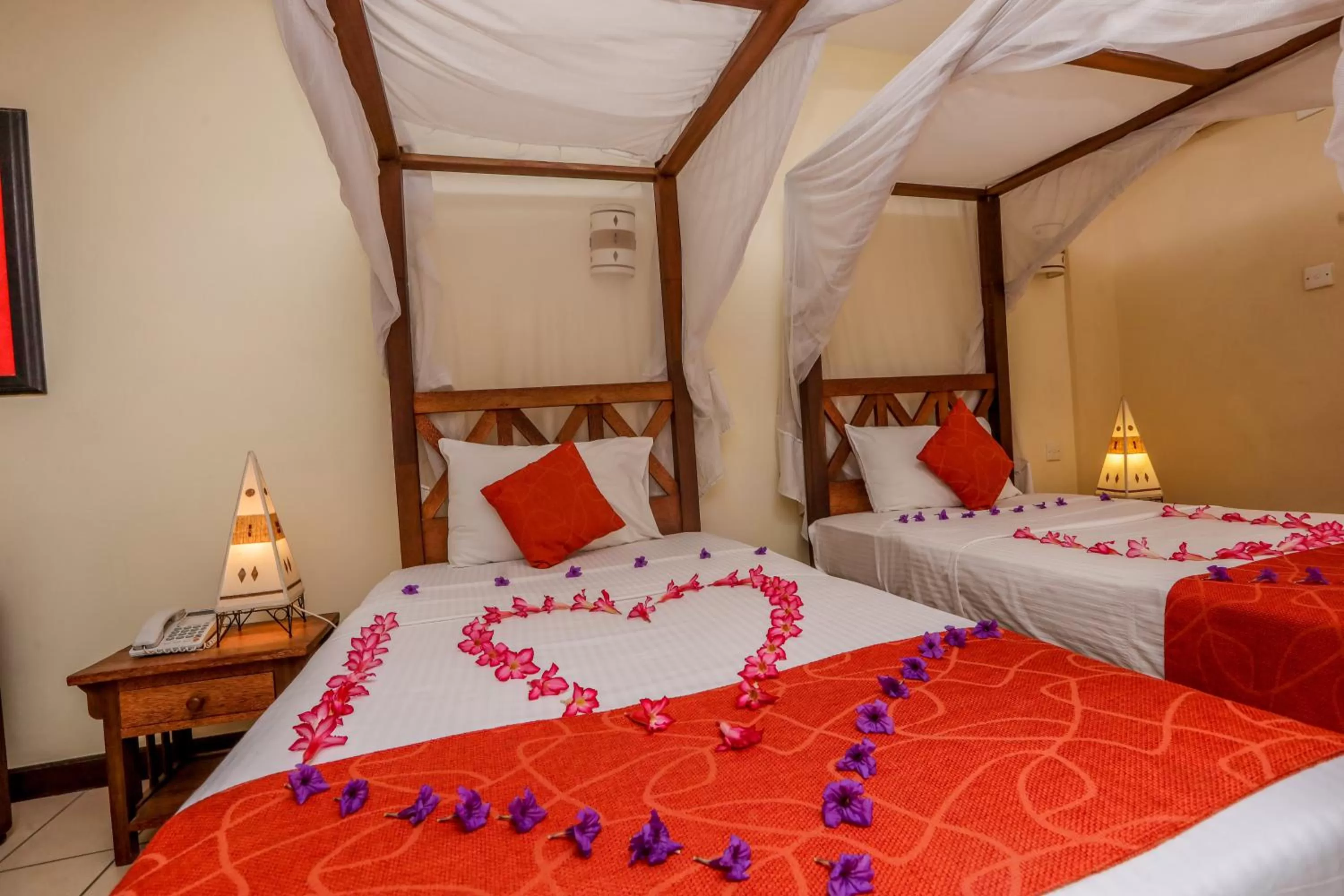 Bed in CityBlue Creekside Hotel & Suites