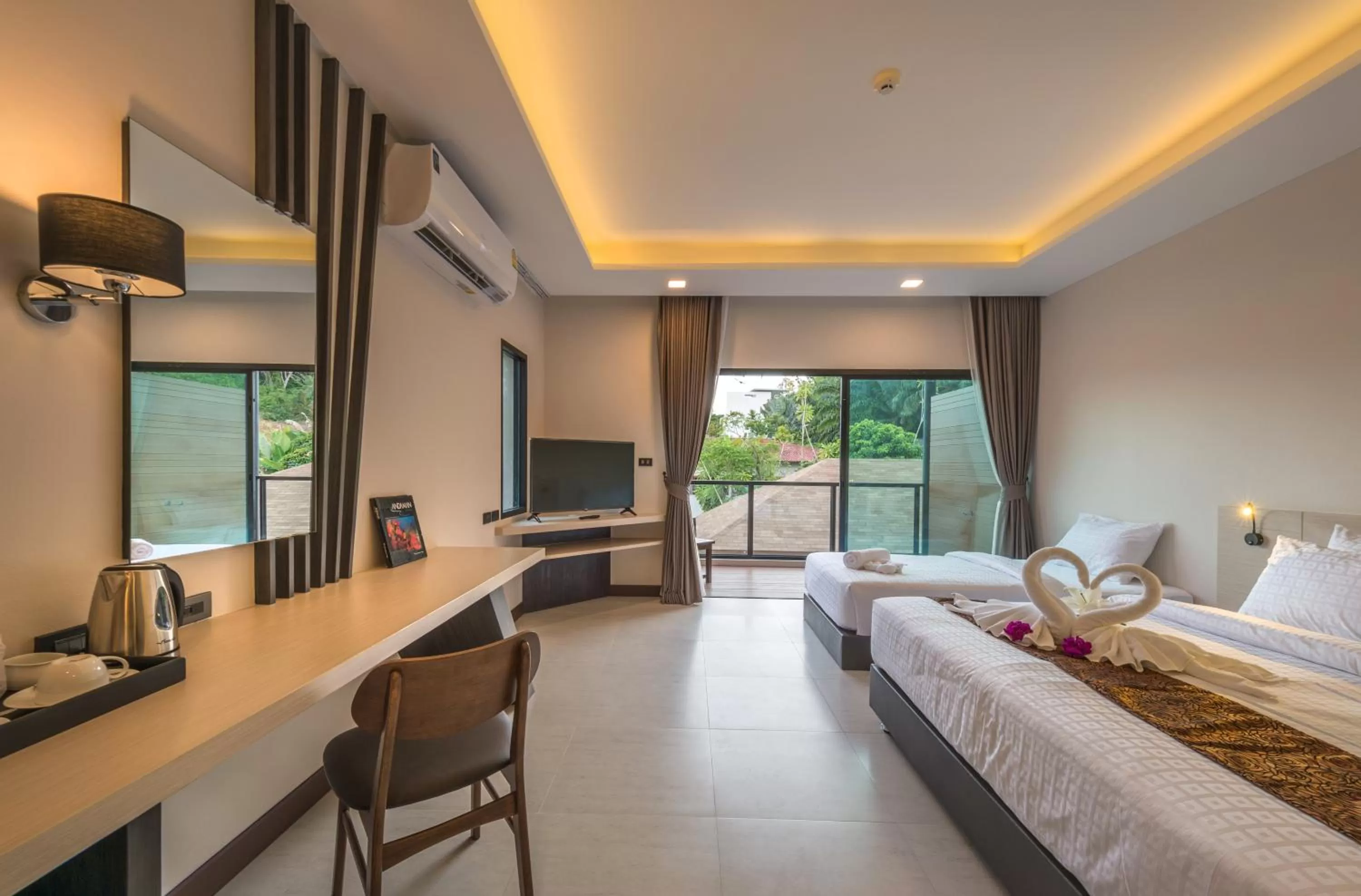 Bed in Cher​mantra​ Aonang​ Resort & Pool​ Suite