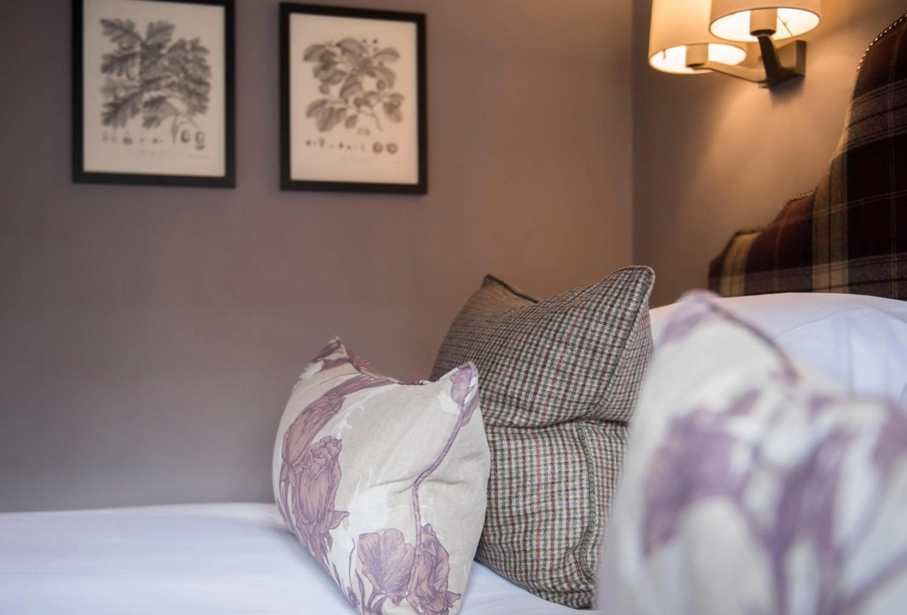 Bed in The Lygon Arms - an Iconic Luxury Hotel