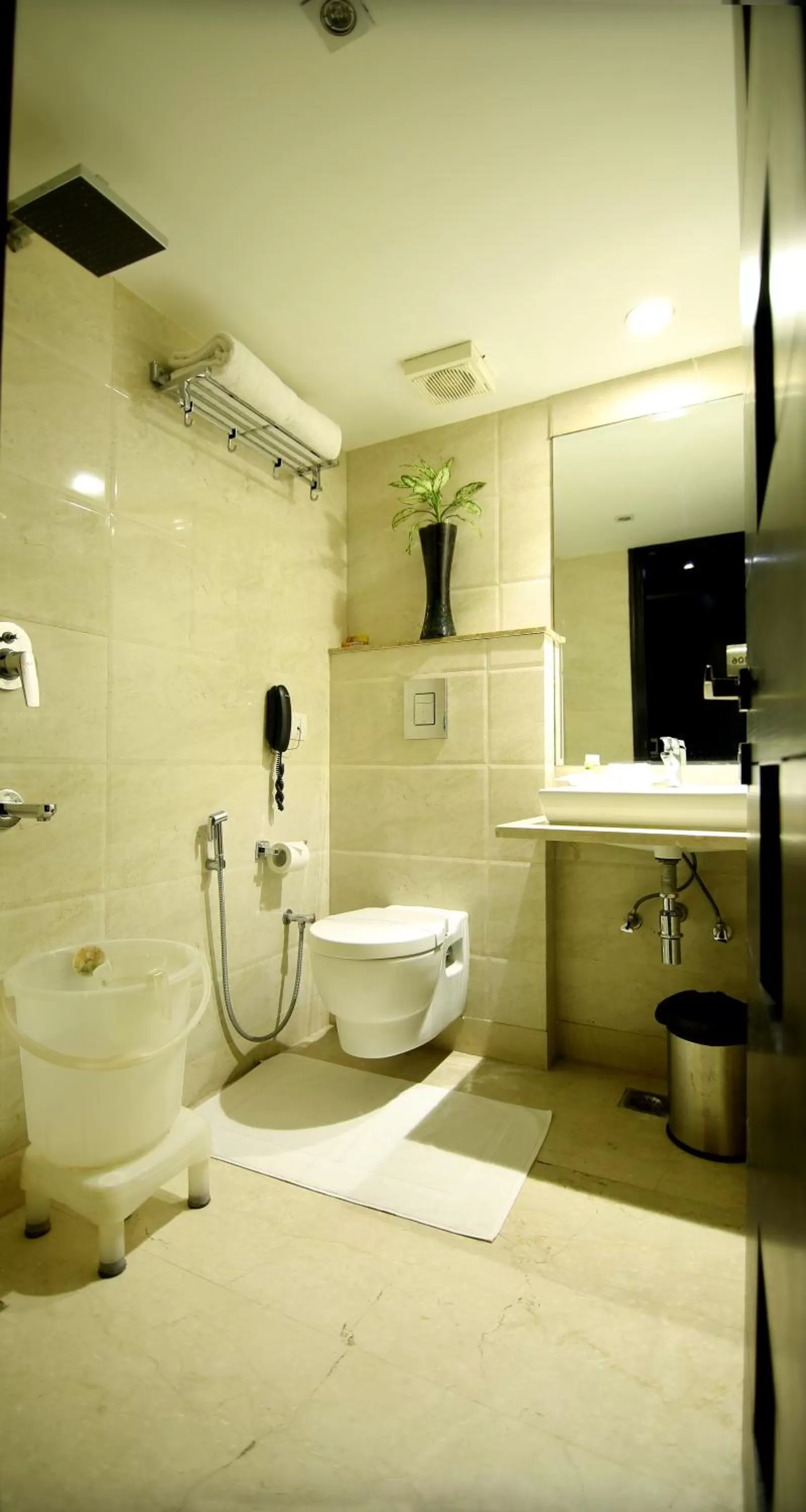 Bathroom in Hotel The Prime Balaji Deluxe, City Centre, With Free Airport Pickup