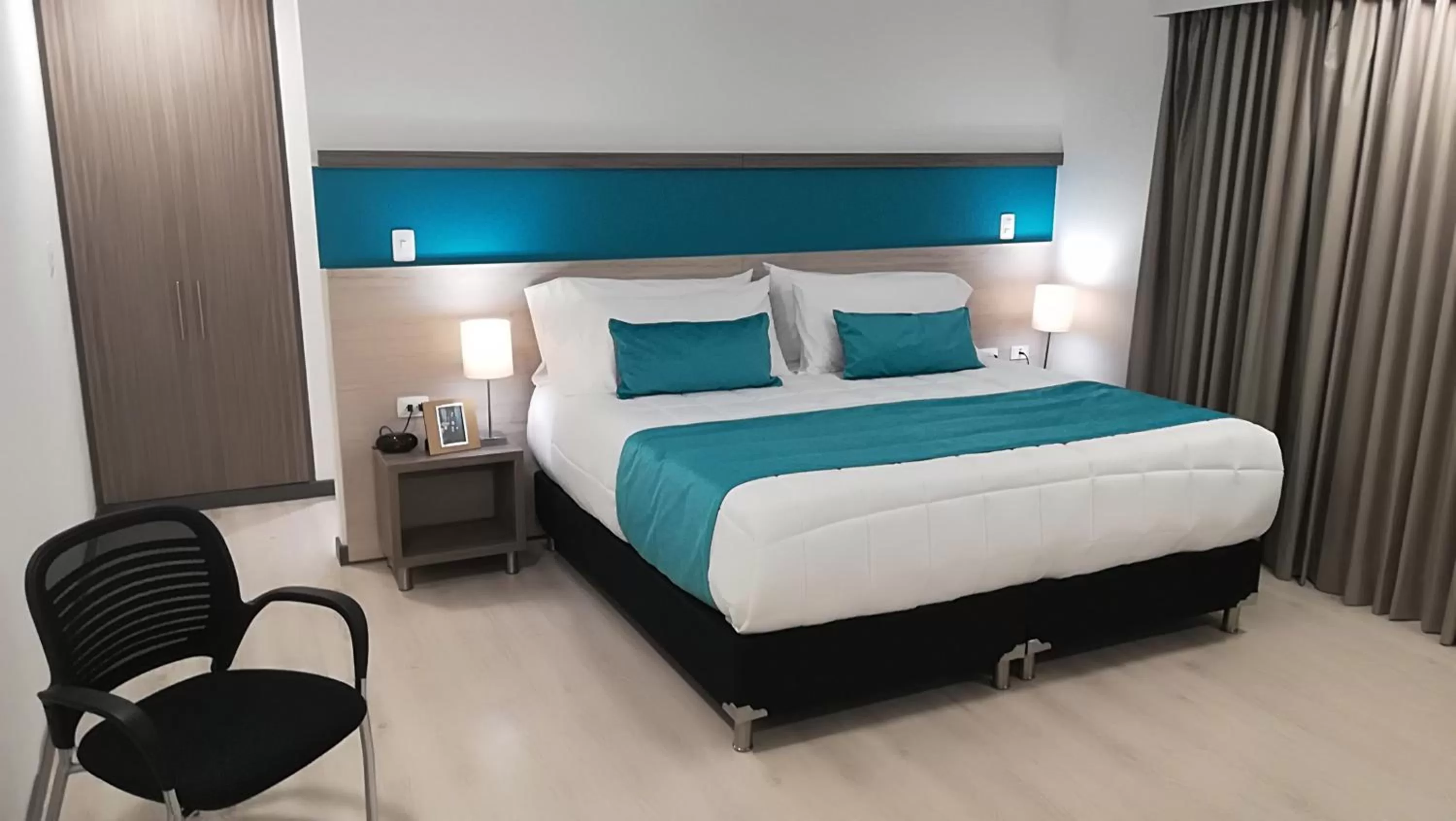 Photo of the whole room, Bed in Hotel Nivari Duitama