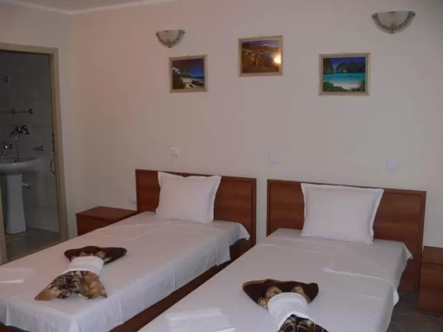 Bed in Versai Hotel