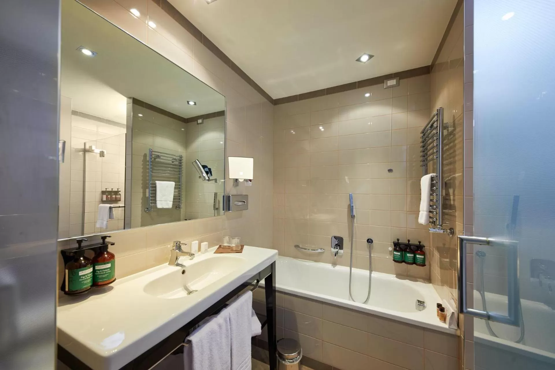 Bathroom in Crowne Plaza Verona Fiera by IHG