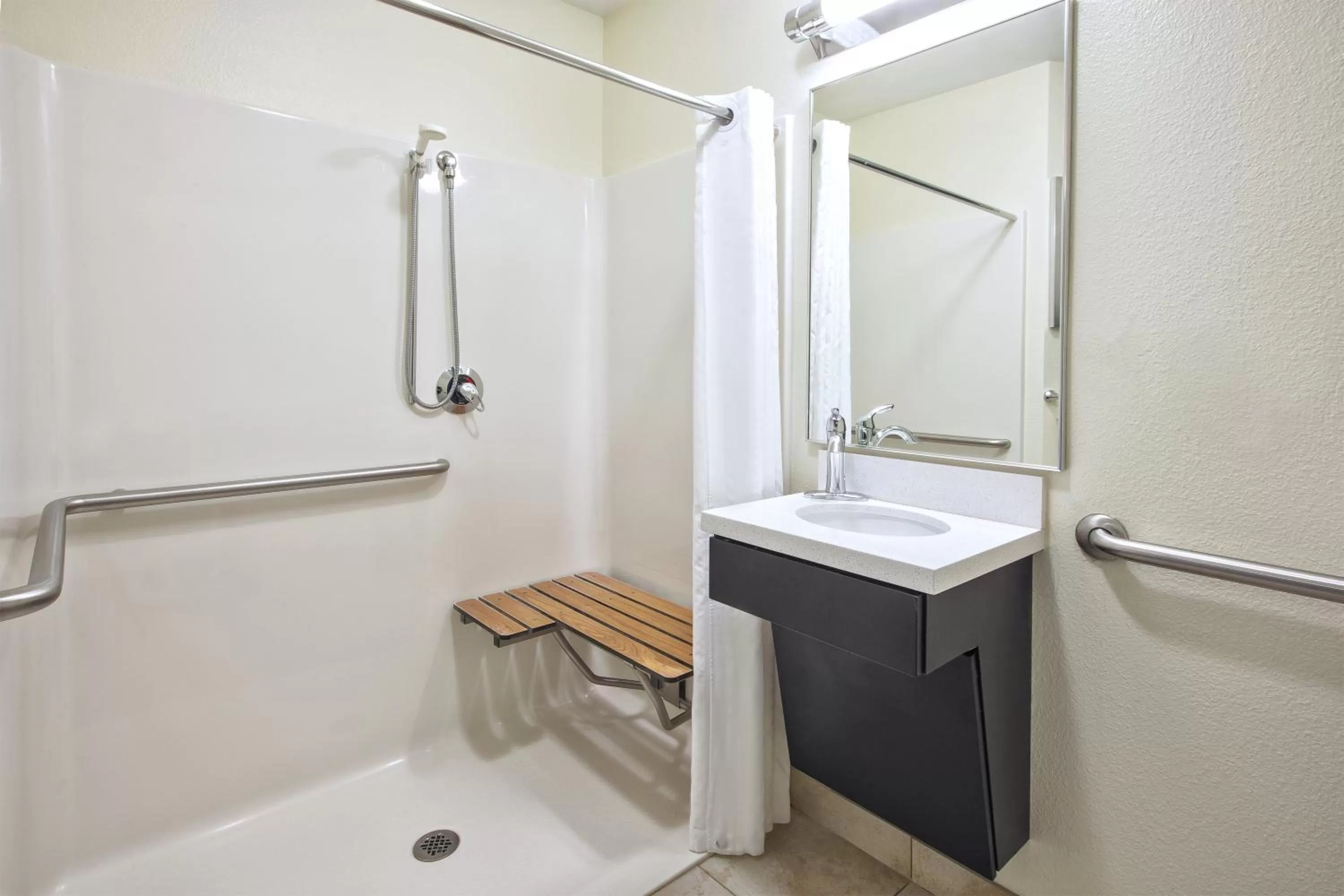 Bathroom in Candlewood Suites Indianapolis Airport by IHG