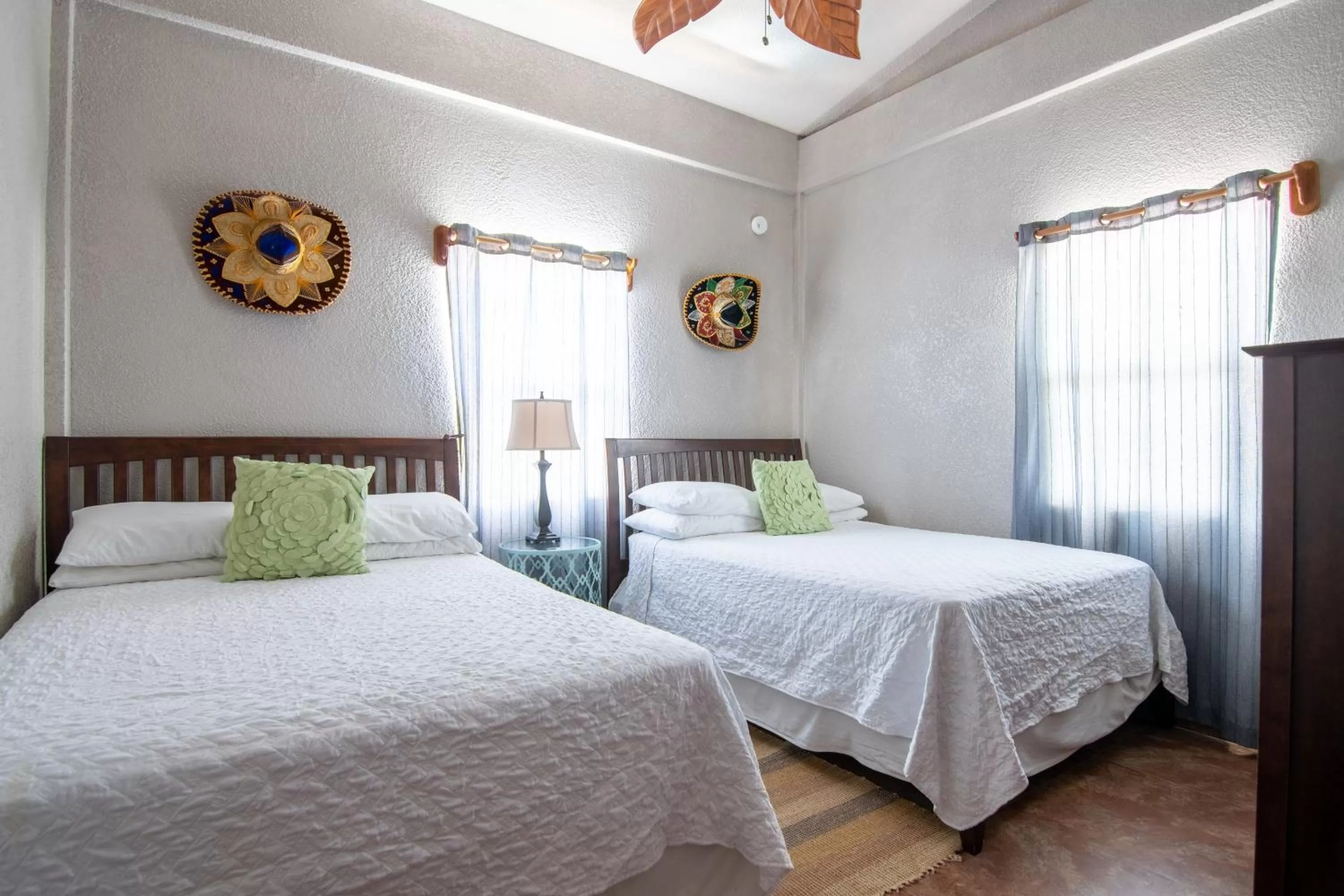 Bed in Lighthouse Beach Villas