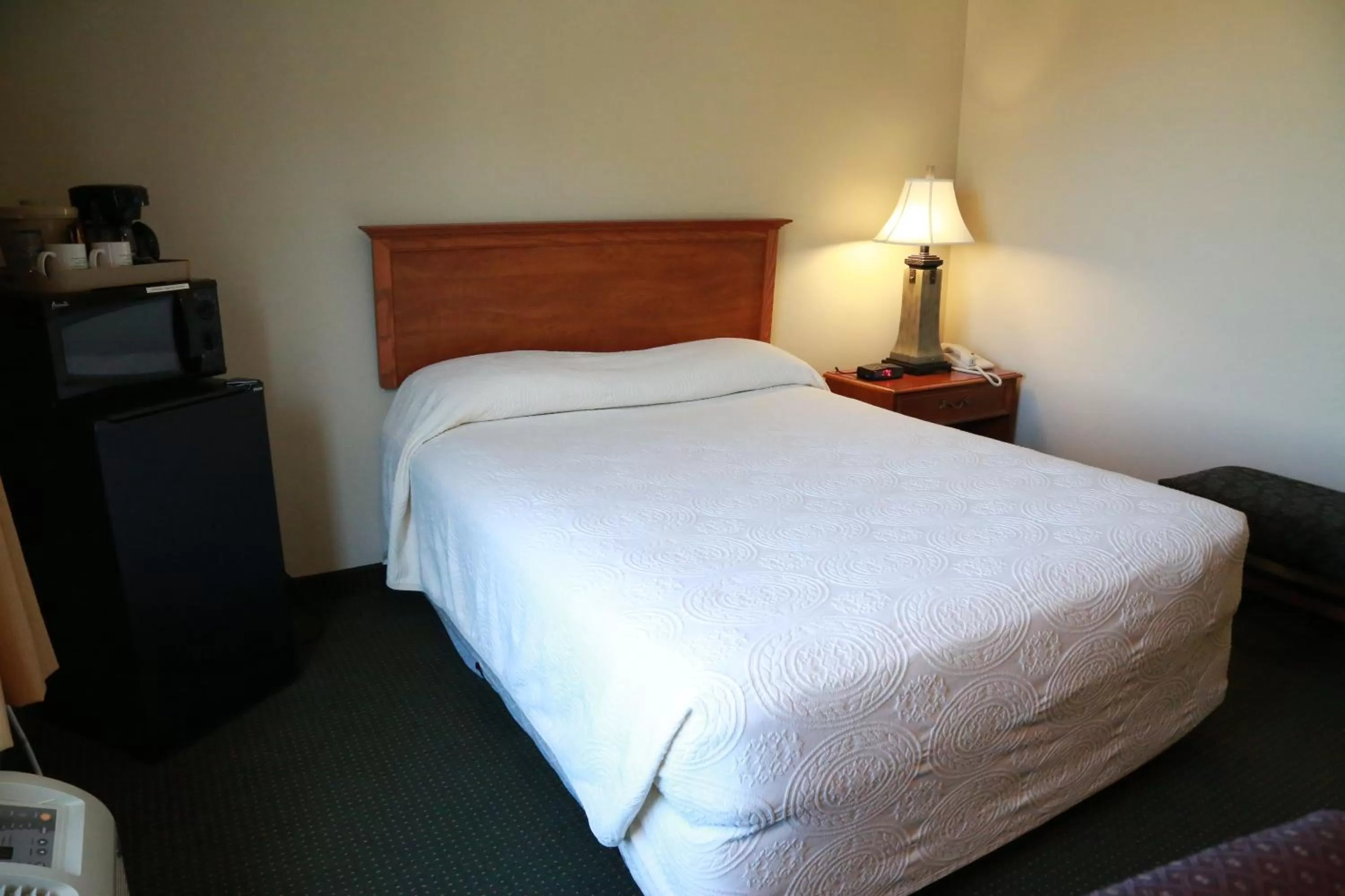 Bed in Horizon Inn & Suites