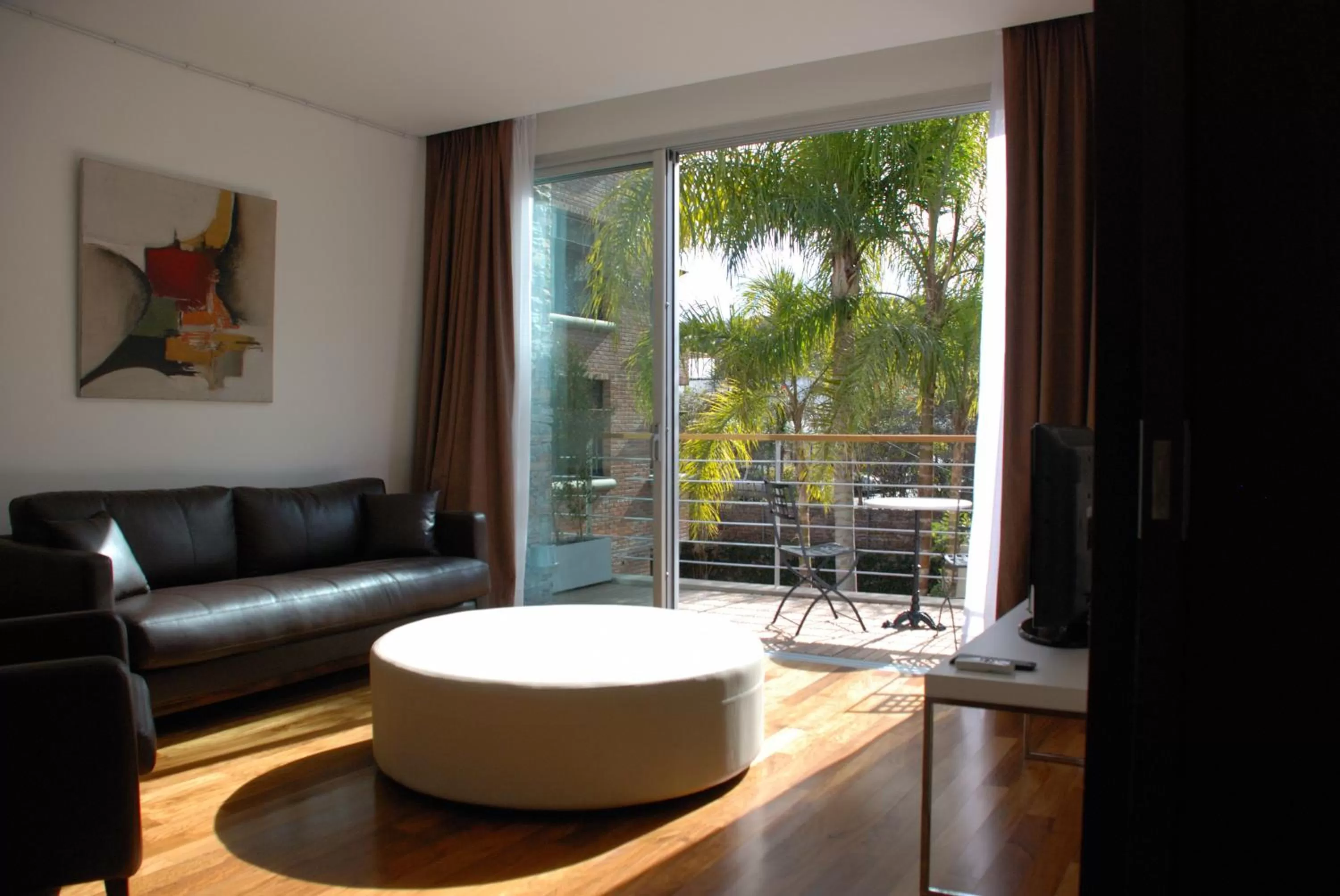 Seating area in San Isidro Plaza Hotel