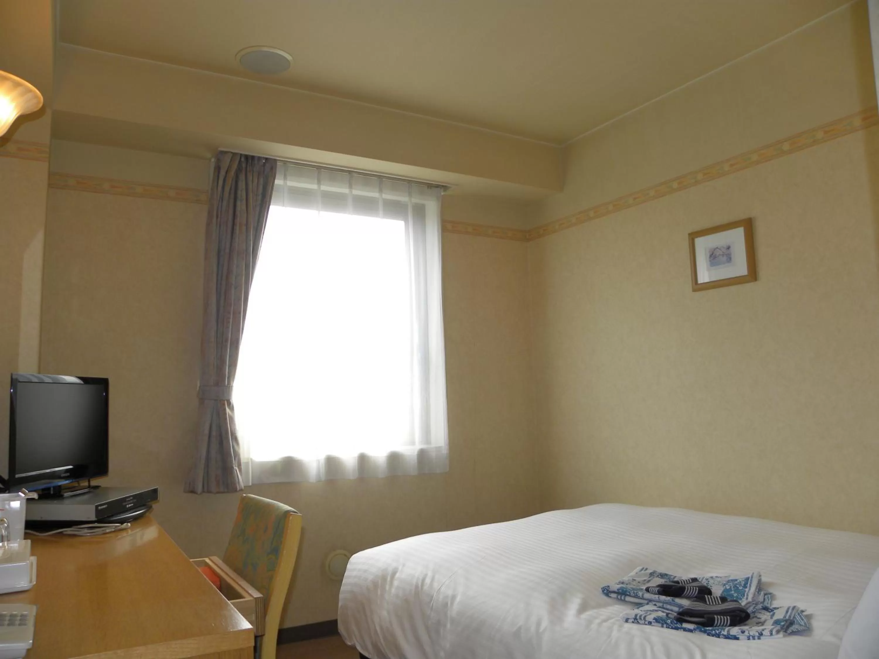 Photo of the whole room, Bed in Hotel Benex Yonezawa