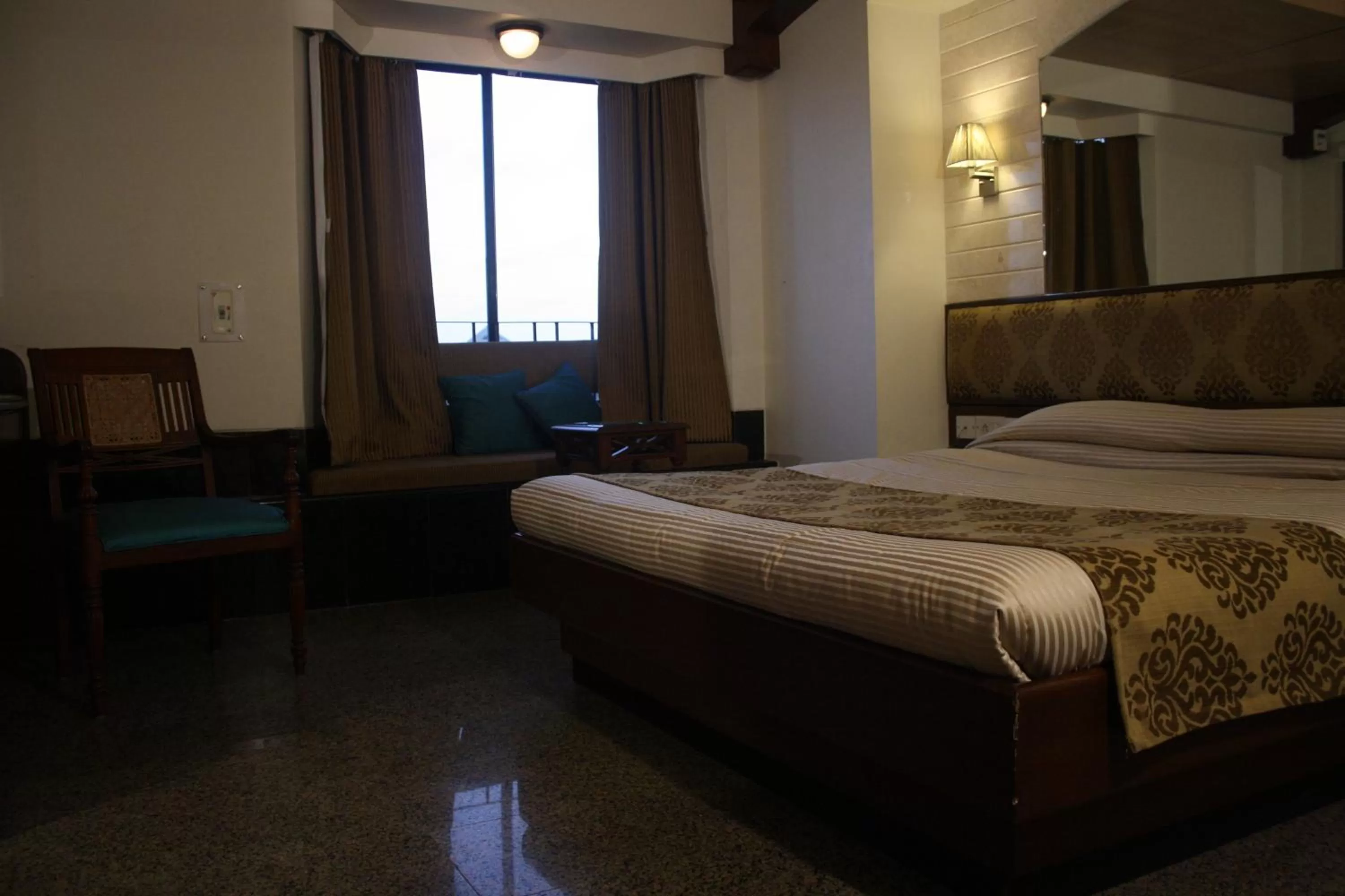 Bed in Hotel Karl Residency