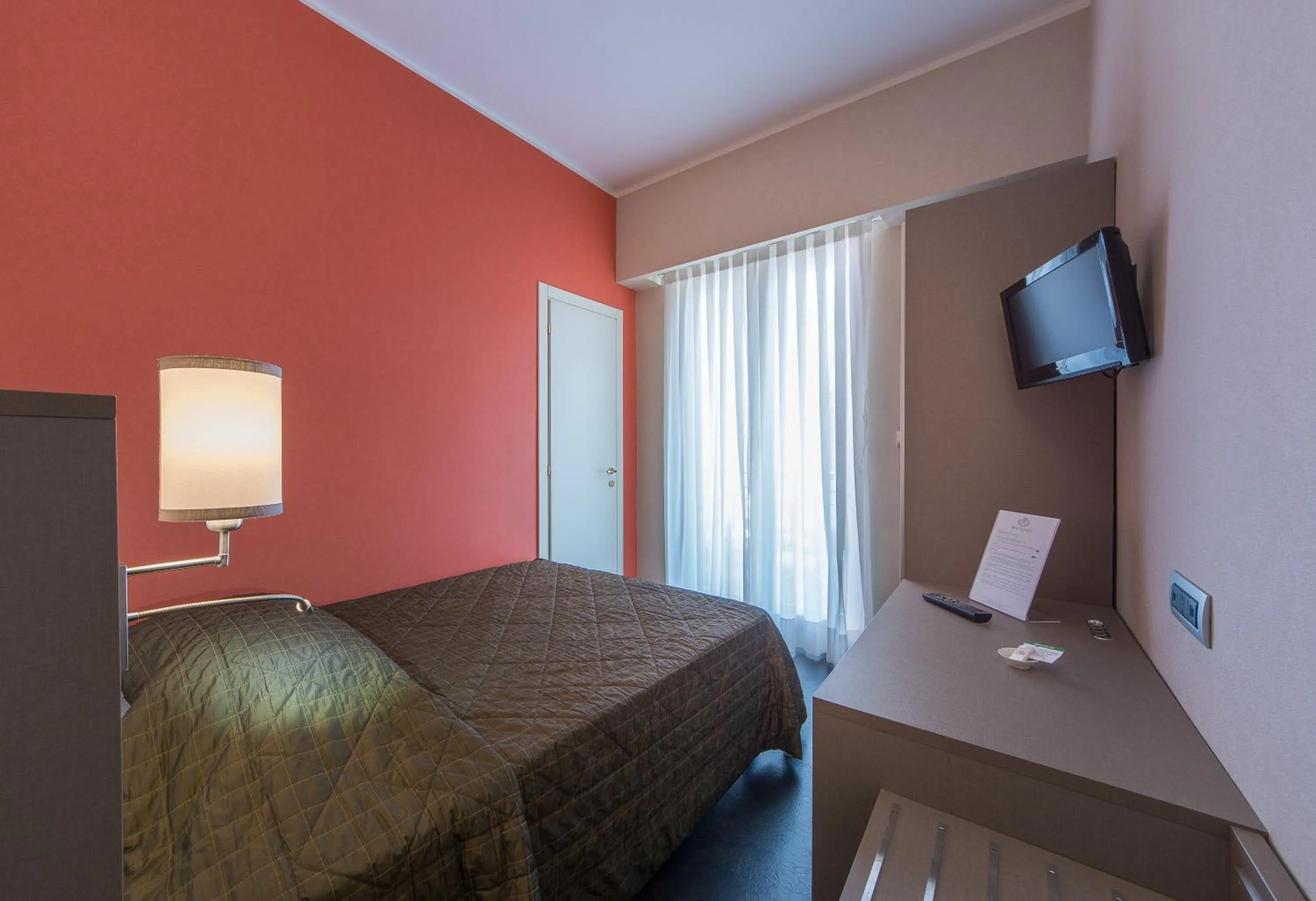 Bed in Reginna Palace Hotel