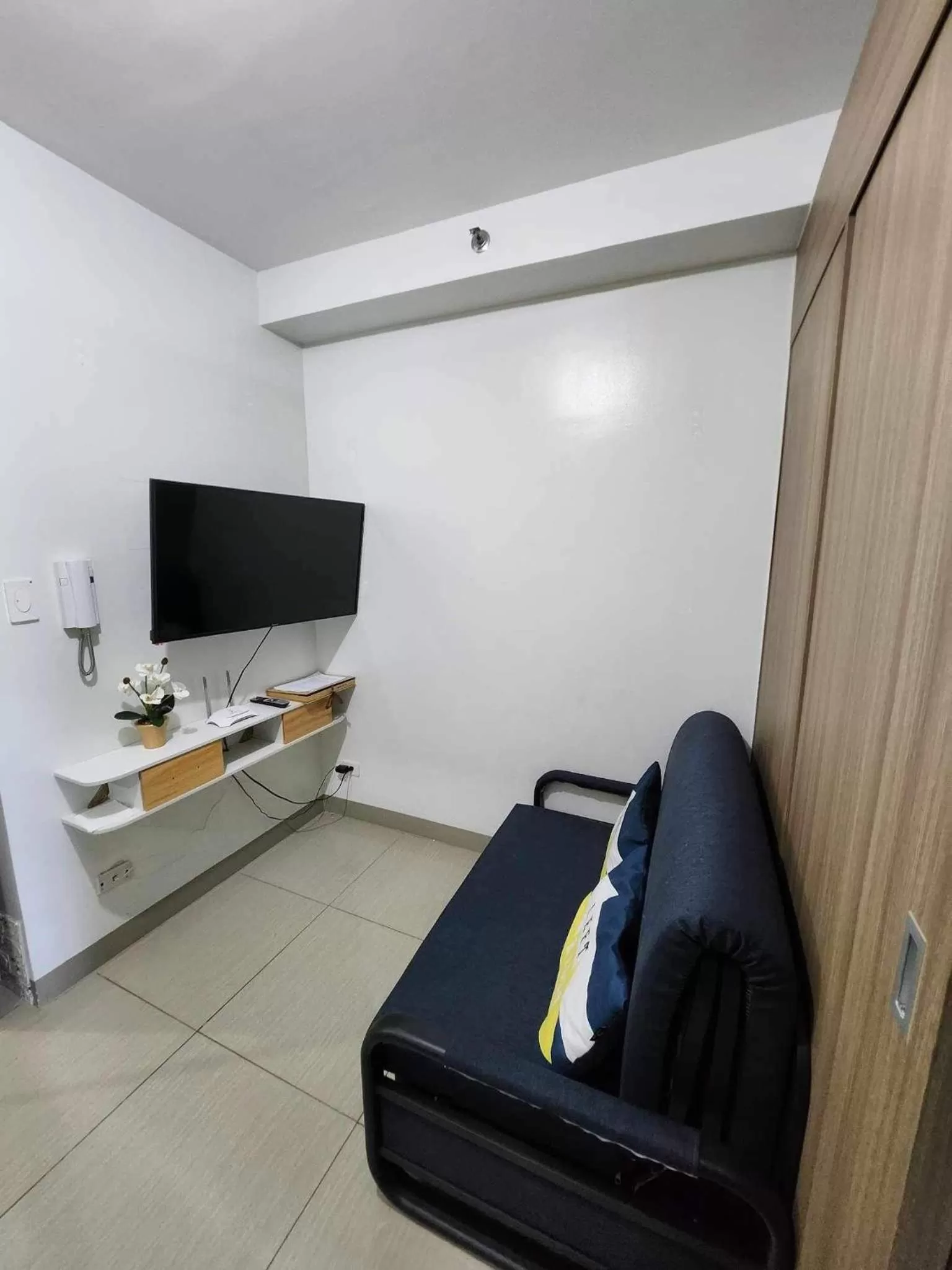 Living room in NorChel's Staycation near Mall of Asia