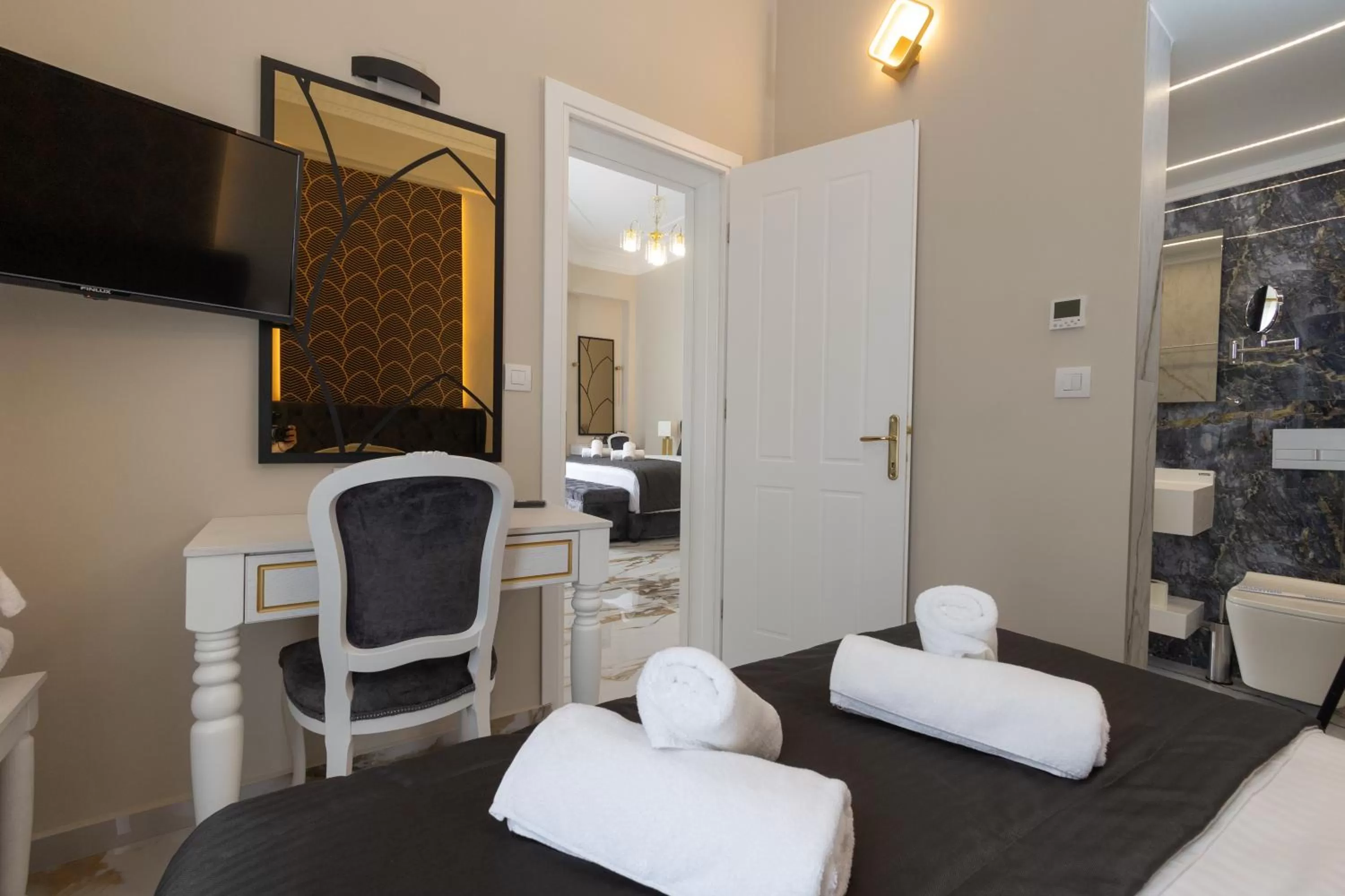 Bed in Modern Revival Luxury Hotel