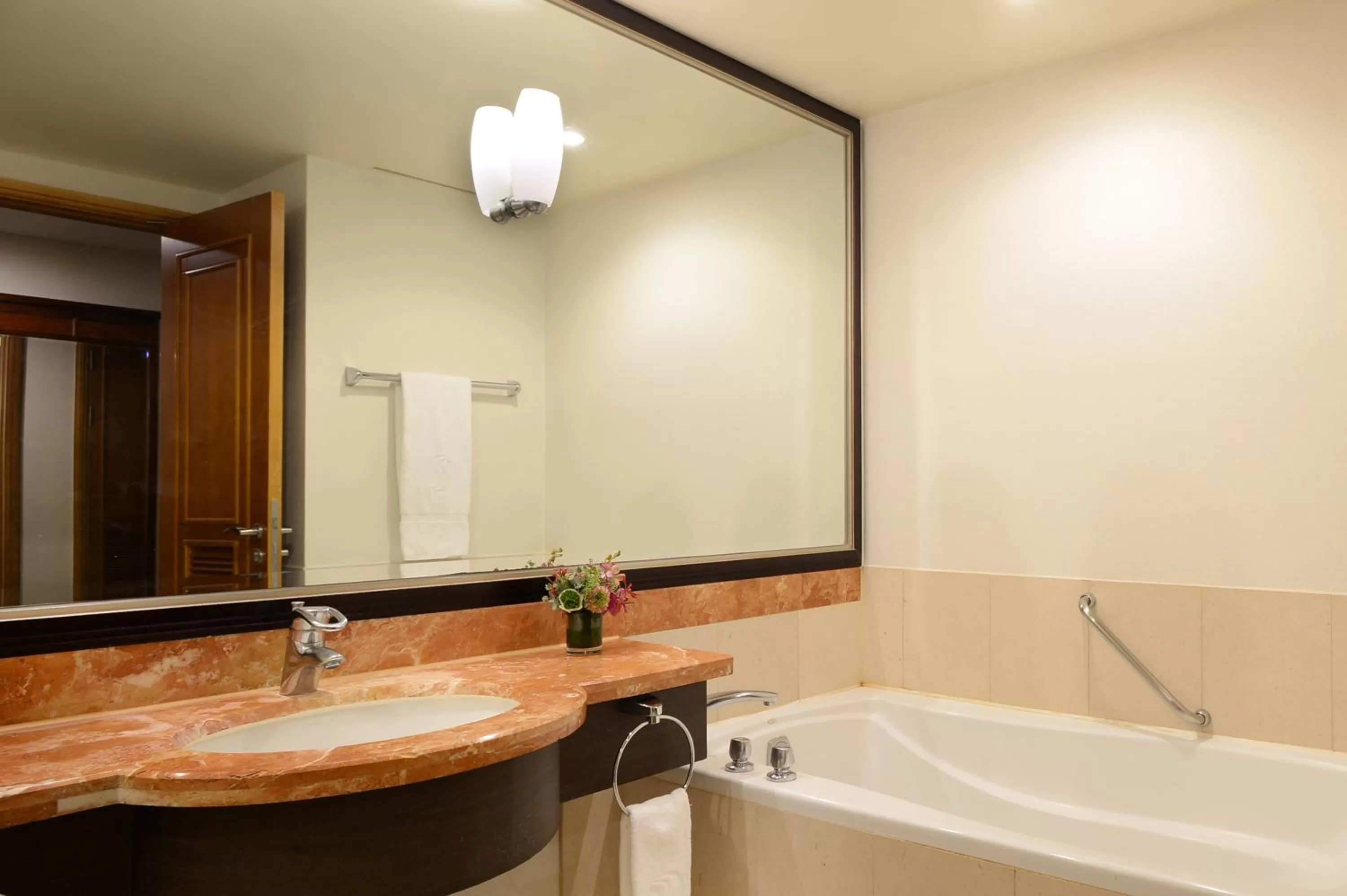 Toilet in Ramada Plaza by Wyndham Jeju Ocean Front