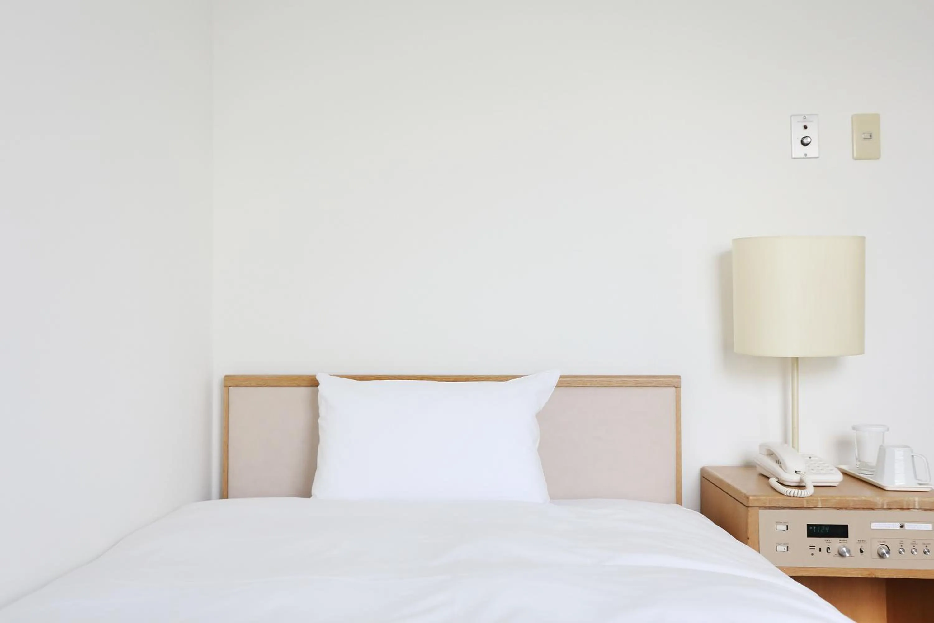 Bed in Hotel International House Osaka