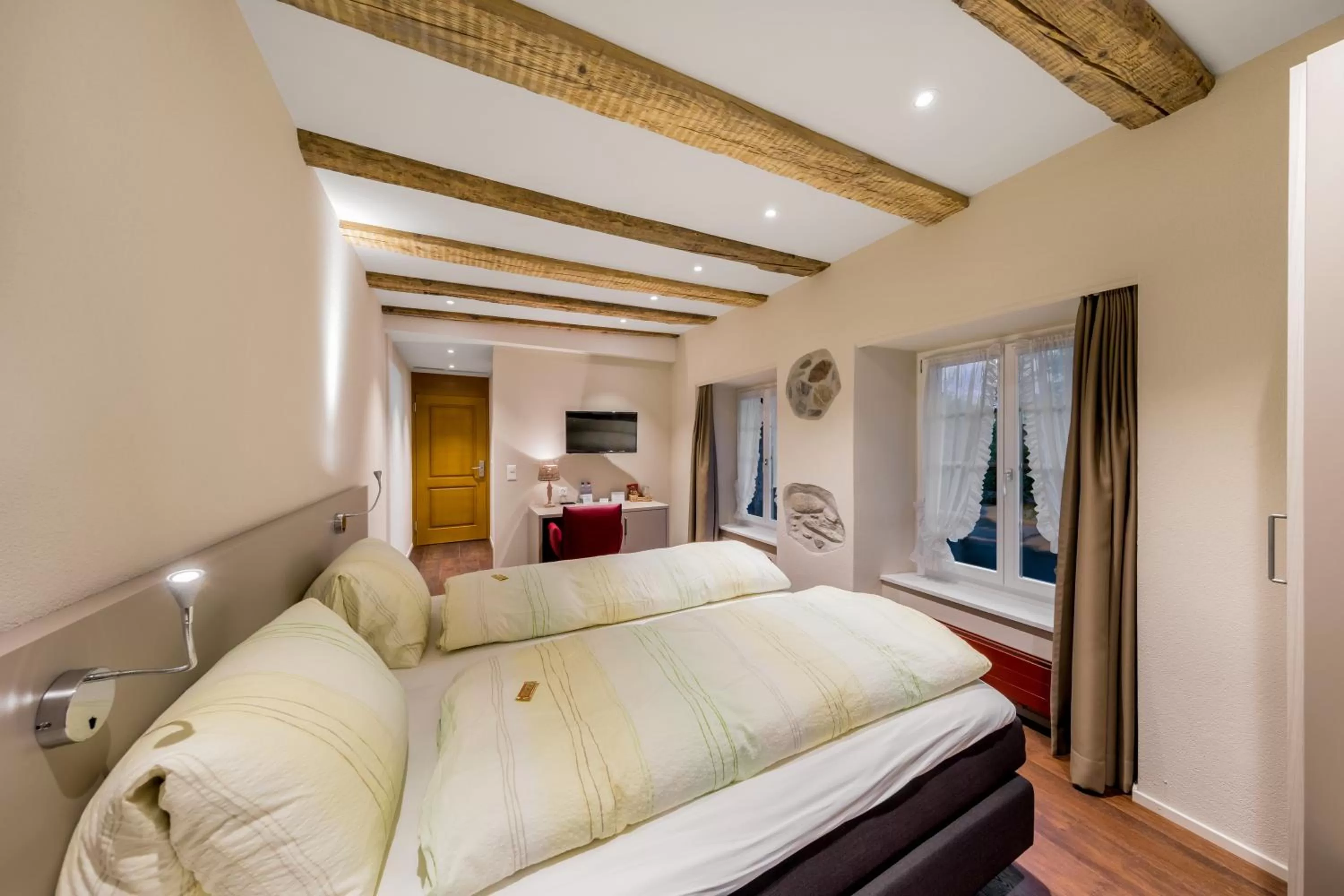 Photo of the whole room, Bed in Hotel Gasthaus Hirschen