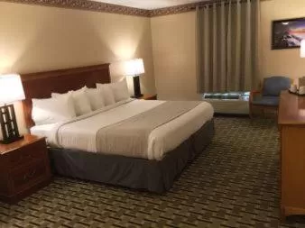 Photo of the whole room, Bed in Days Inn & Suites by Wyndham Sellersburg