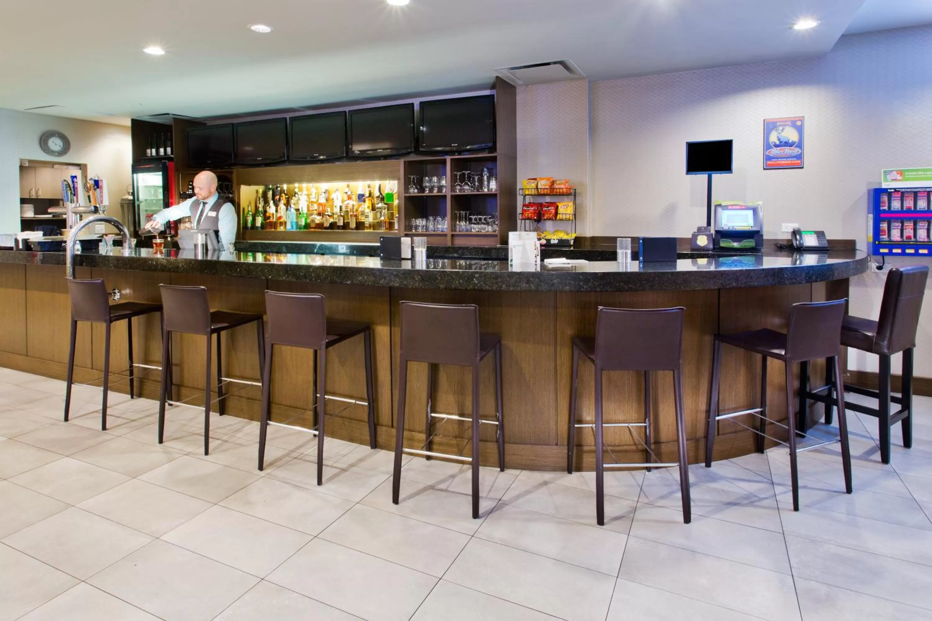 Lounge or bar in Holiday Inn Vancouver-Centre Broadway by IHG