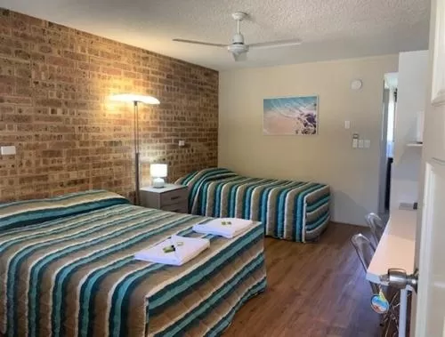 Bed in Golden Beach Motor Inn, Caloundra