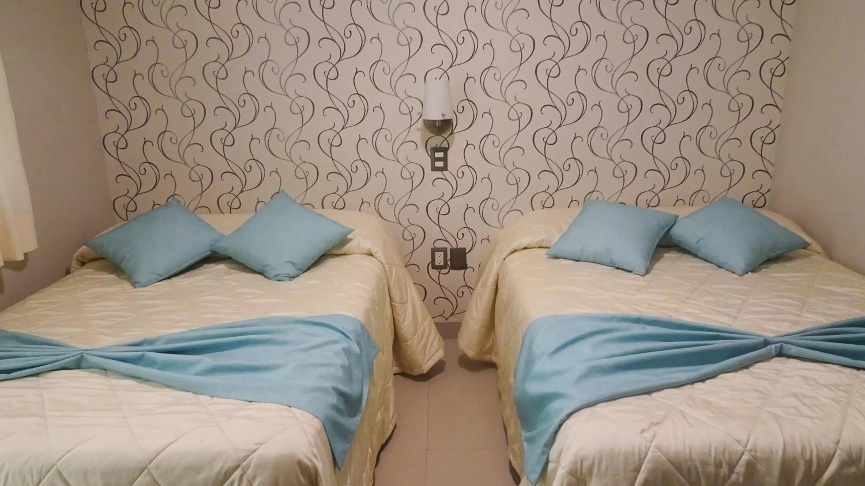 Decorative detail, Bed in Suites San Luis