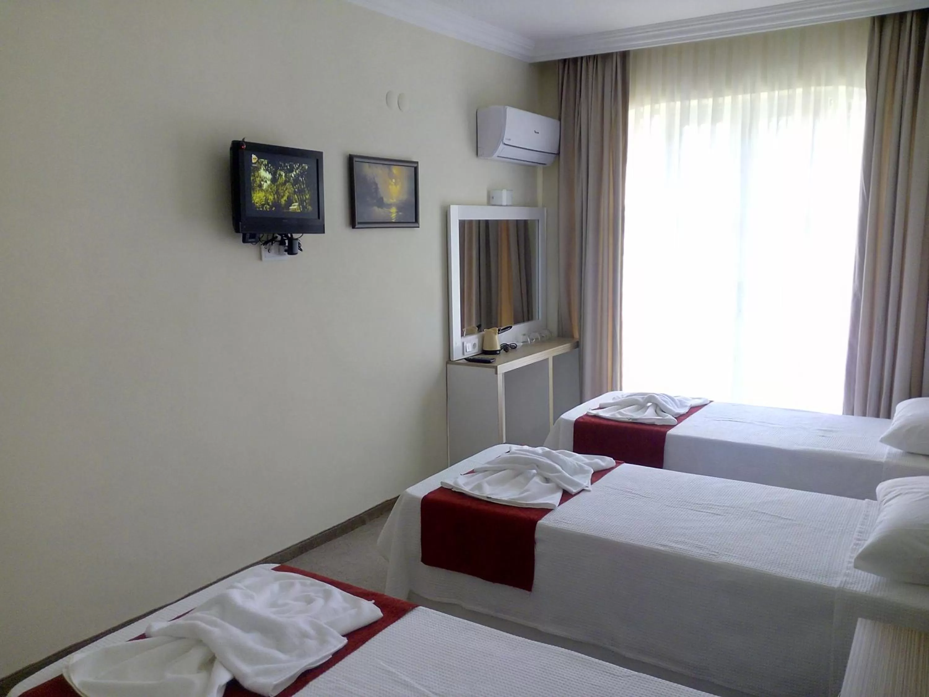 Photo of the whole room, Bed in Nicea Hotel