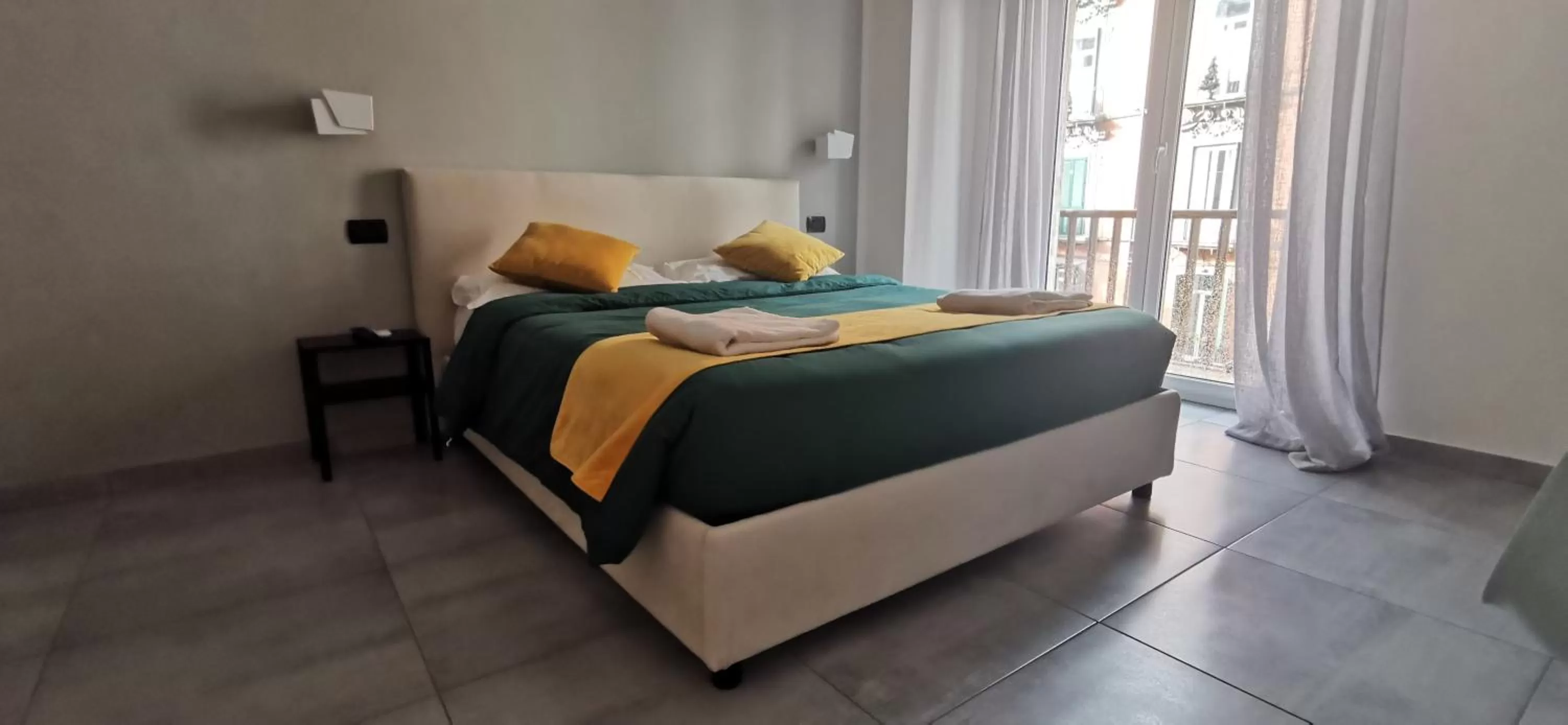 Bed in Hi Relais Rooms