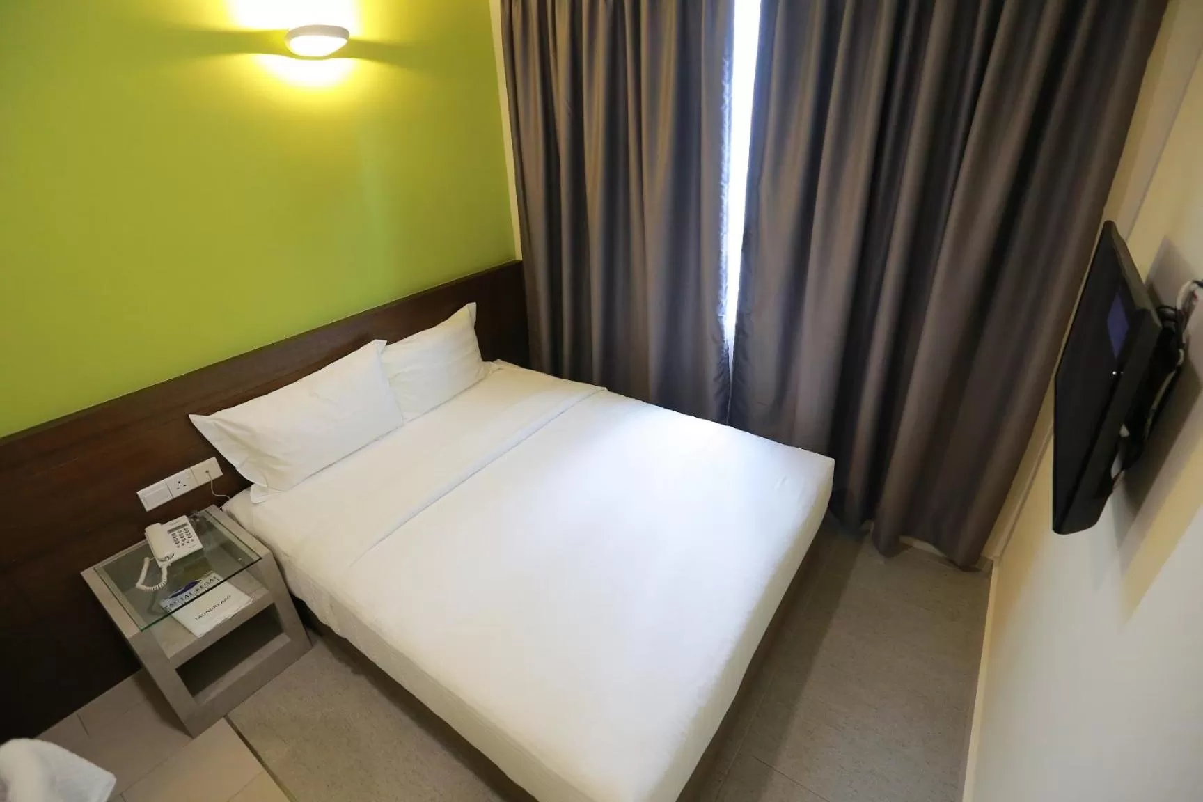 Bed in Pantai Regal Boutique Hotel