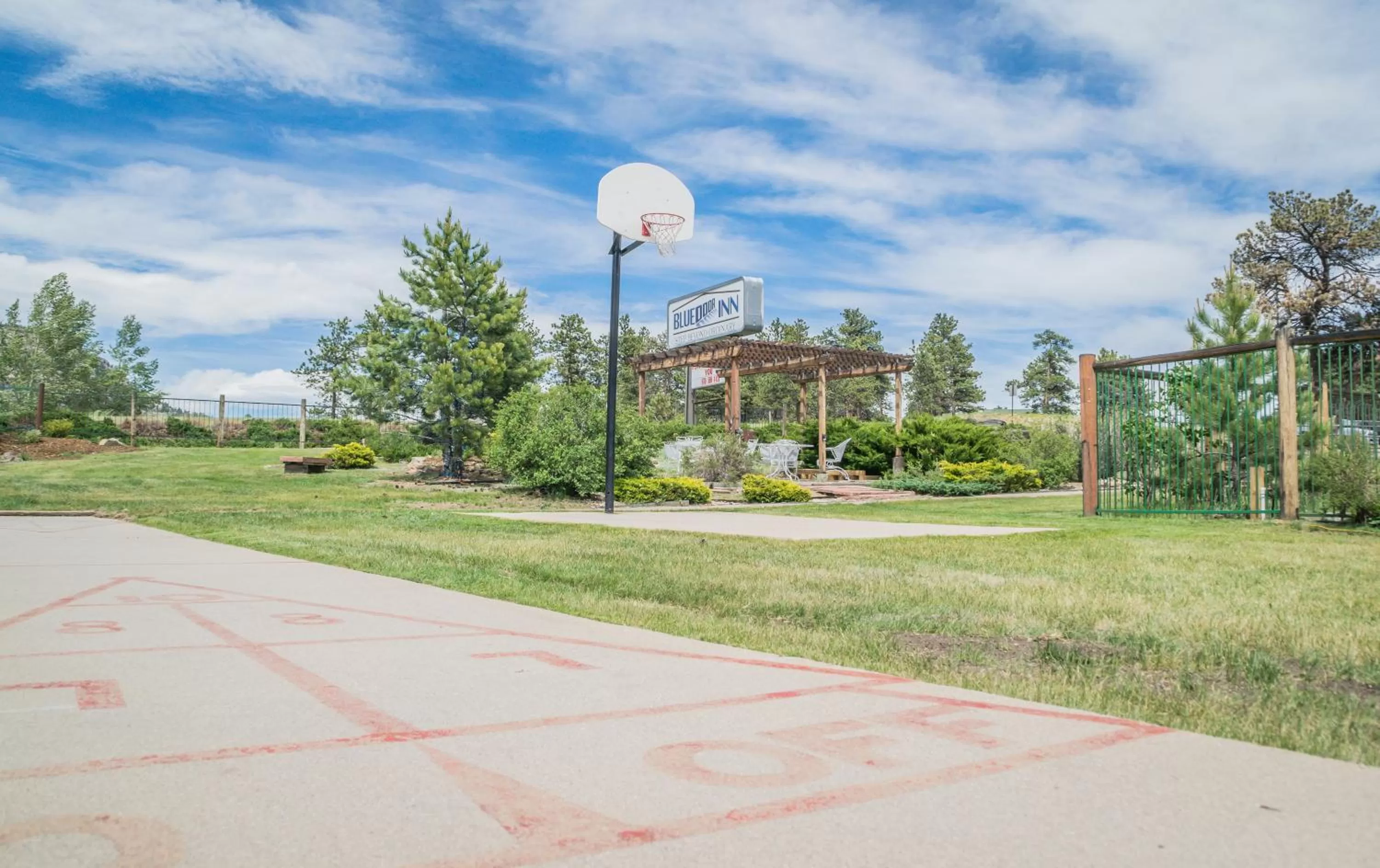 Property logo or sign in Blue Door Inn