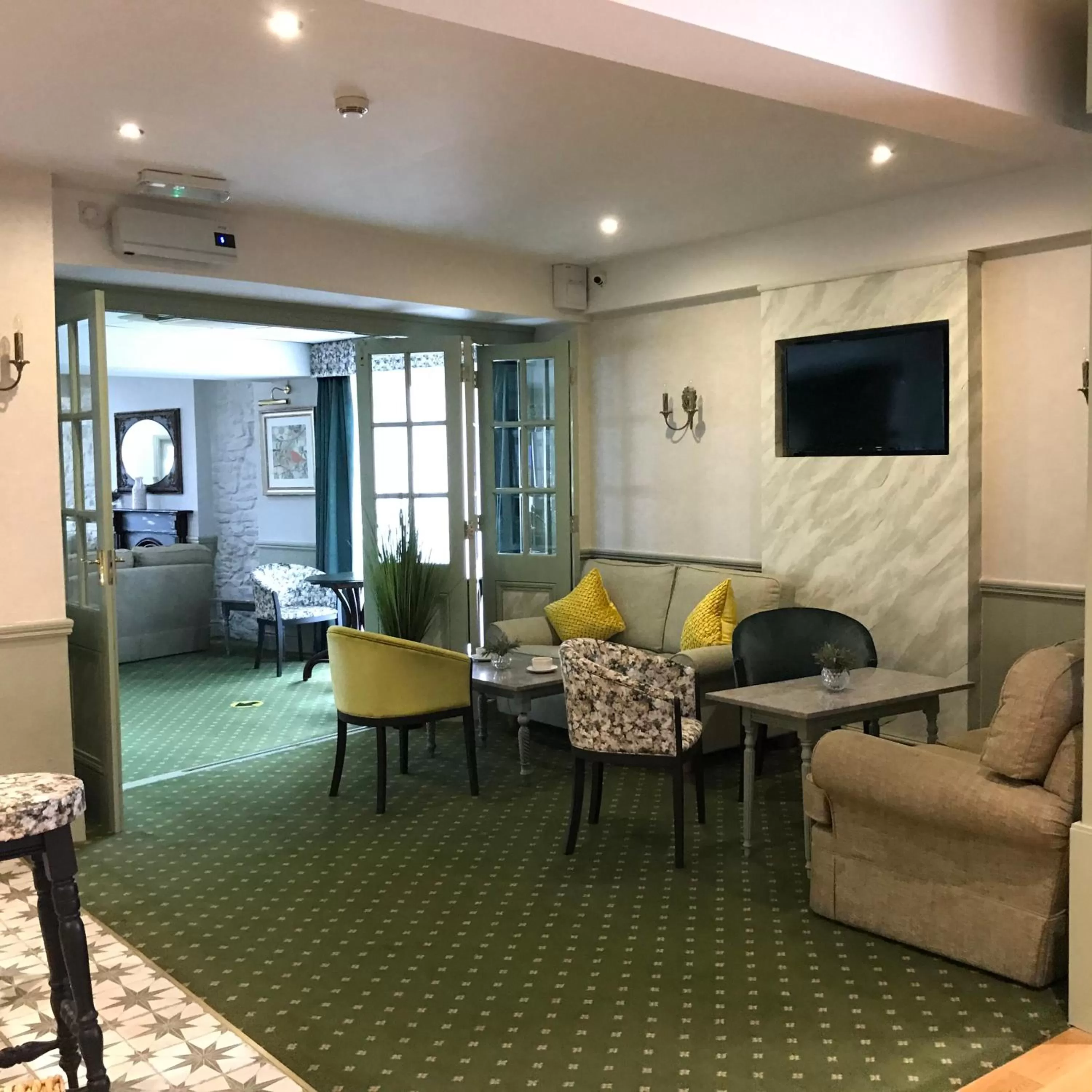 Seating area in Falcon Hotel