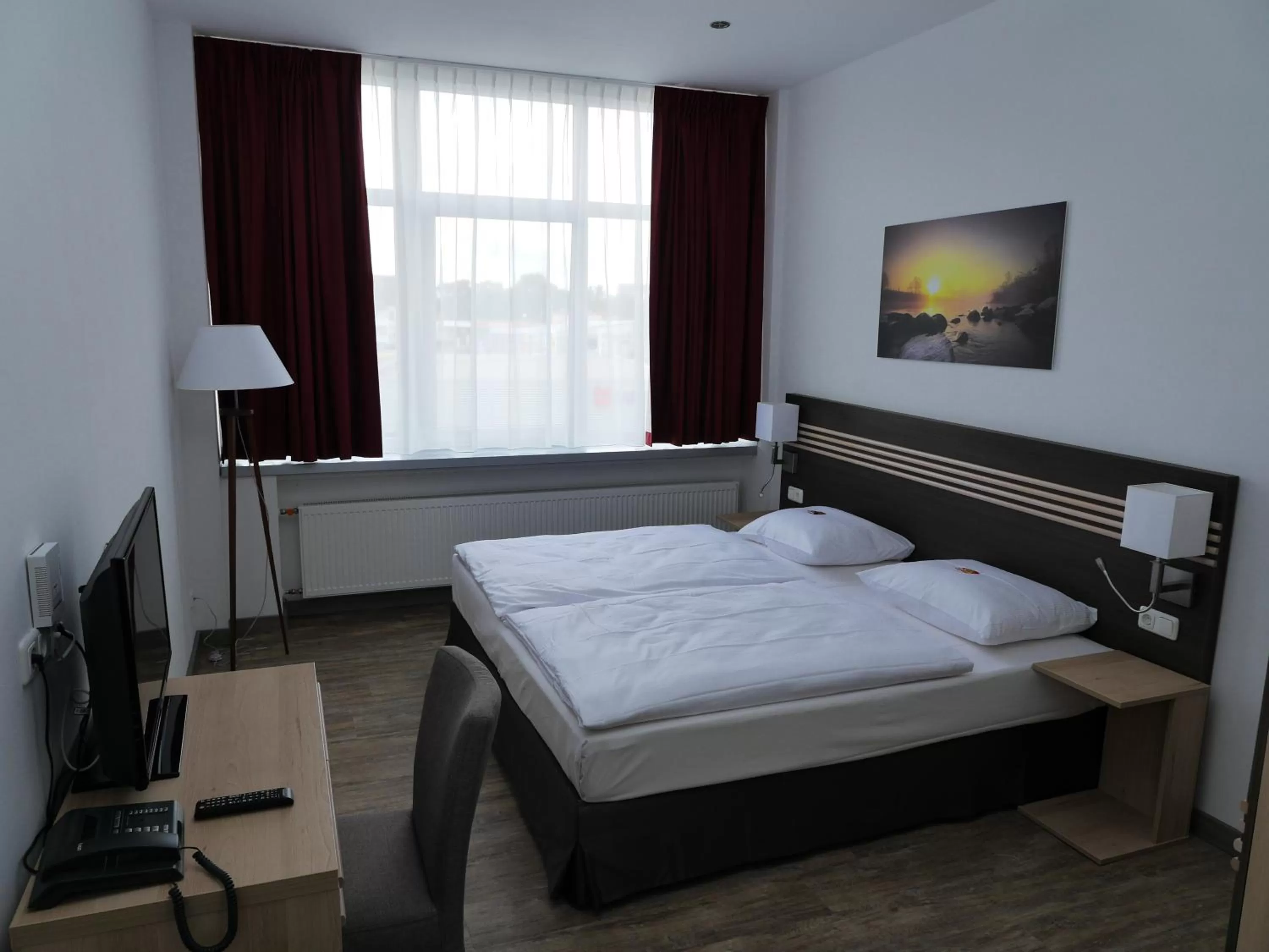 Bed in Ruhr Inn Hotel