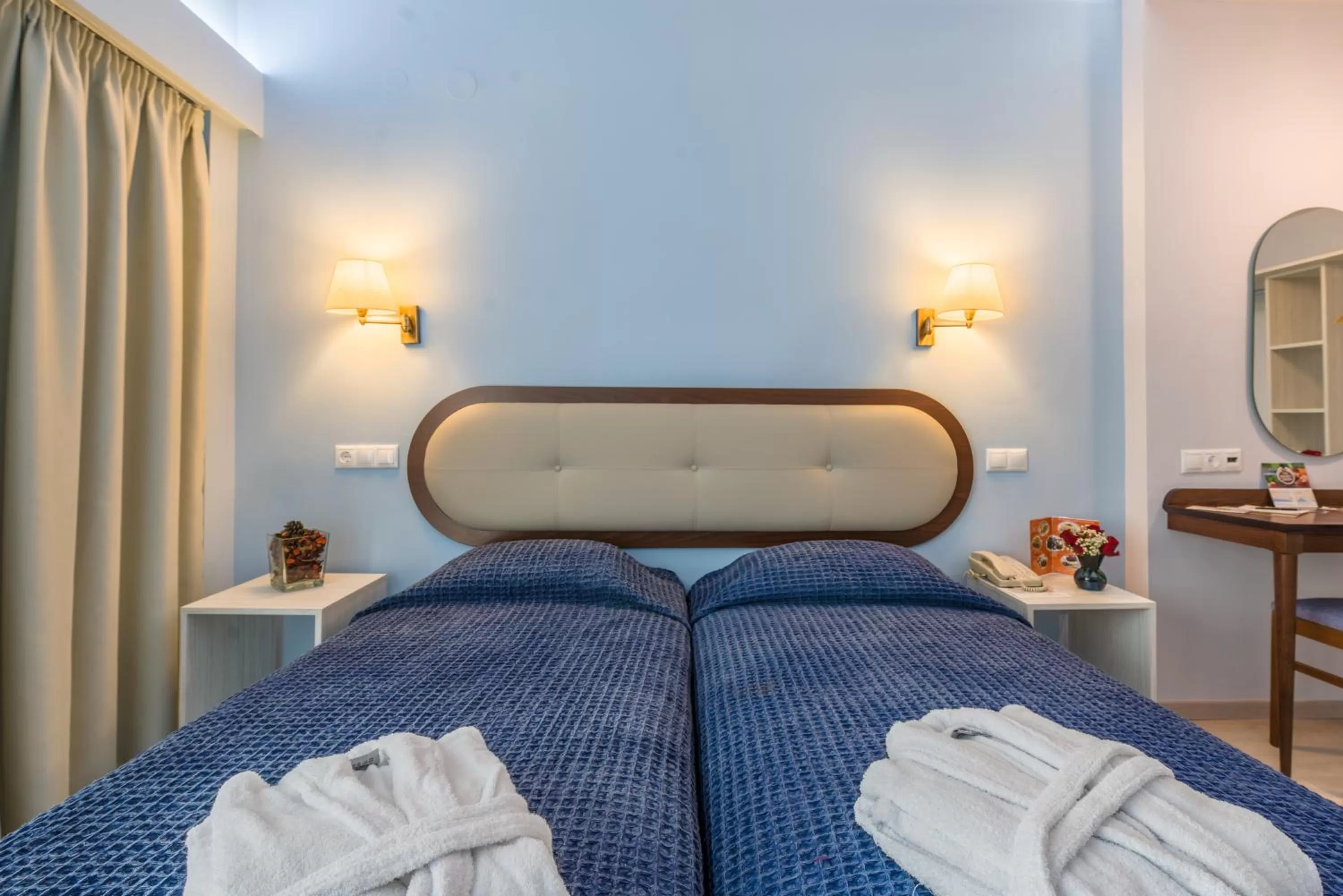 Bed in Queen Olga Hotel