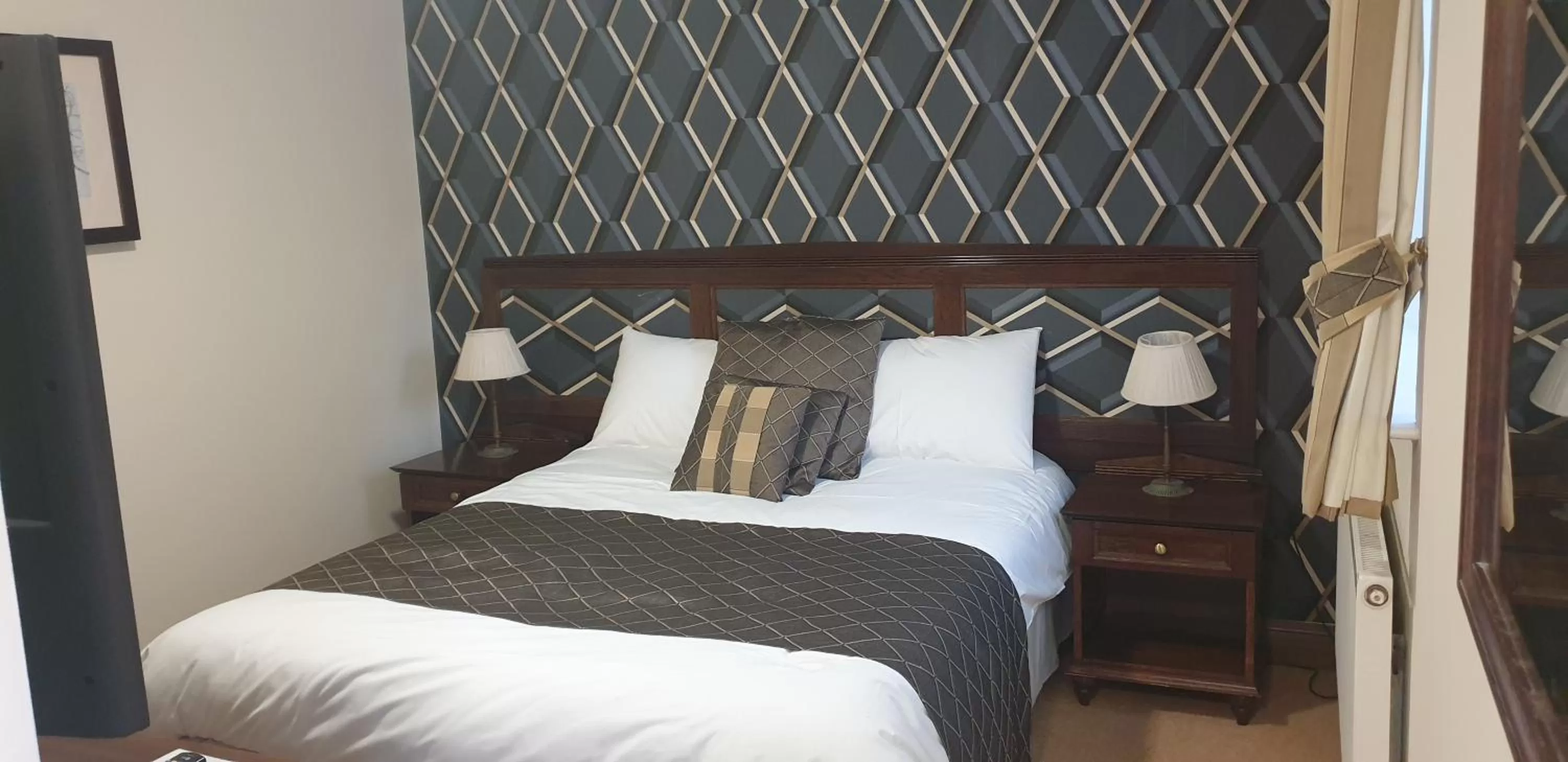 Bed in The Flying Bull Inn