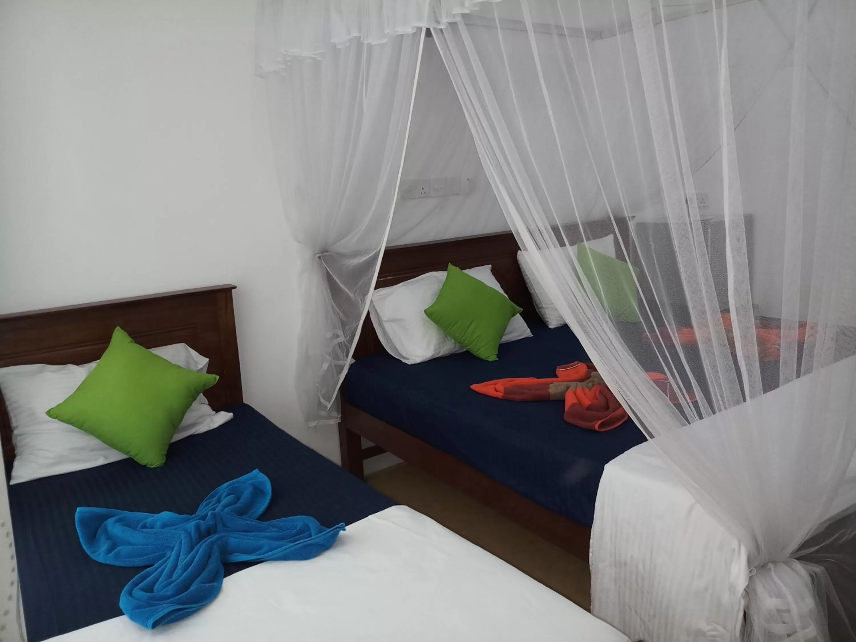 Photo of the whole room, Bed in Turtle Bay Beach Resort