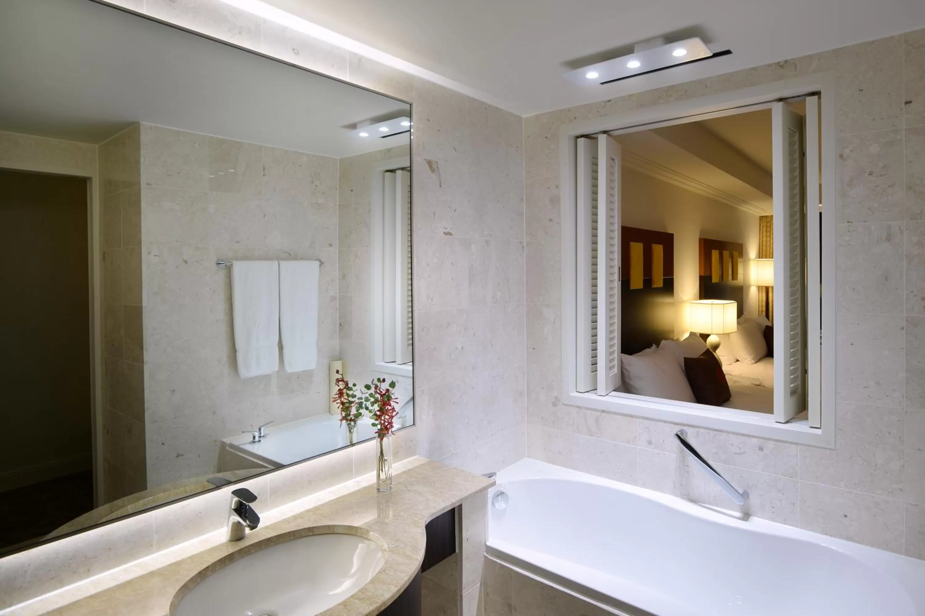 Bathroom in Ramada Plaza by Wyndham Jeju Ocean Front