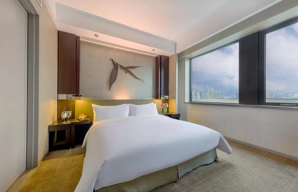 Bed in Shanghai Parkyard Hotel