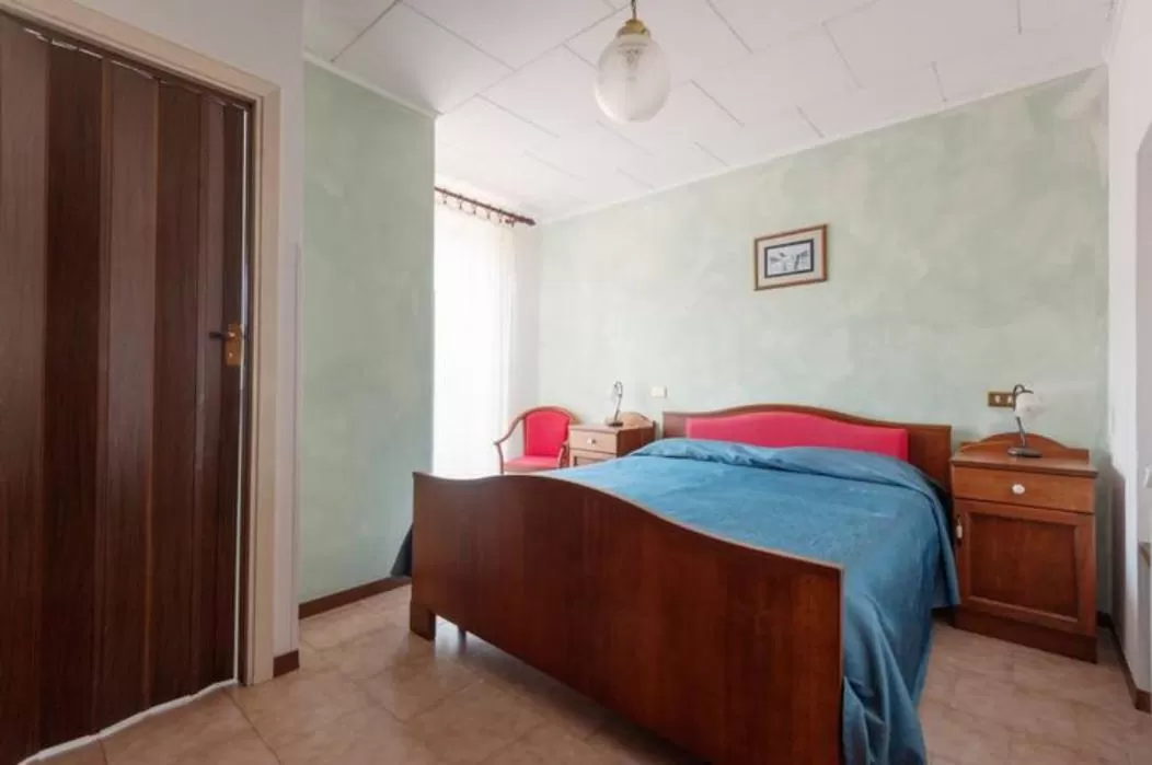 Bed in Albergo Miramonti